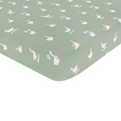 The corner of the Twin Sheet in Silly Goose shown on a twin mattress