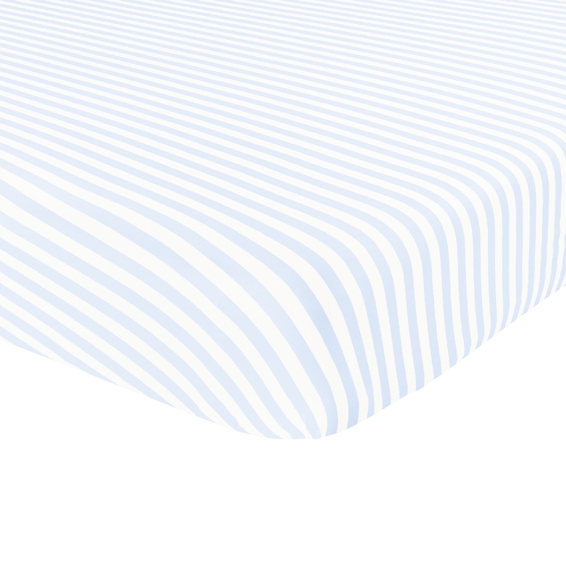 Corner of the Twin Sheet in Small Mist Stripe shown on a mattress