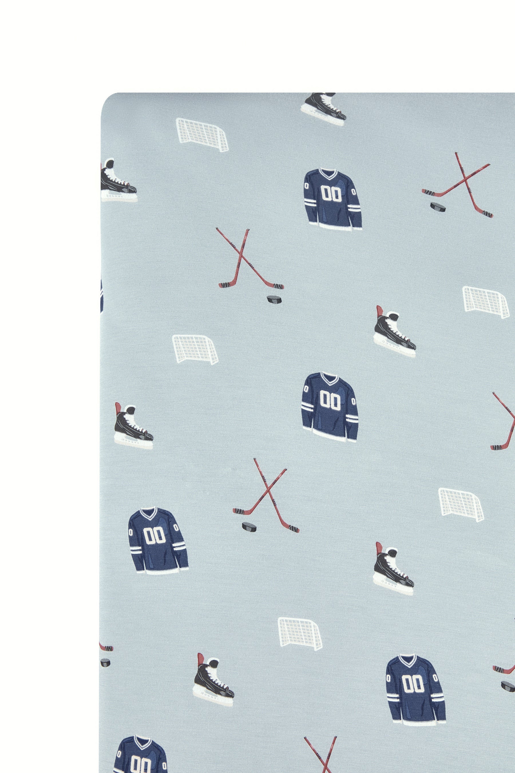 Close up of Twin Sheet in Vintage Hockey print on a white background