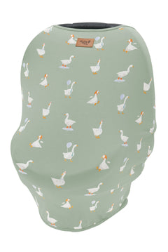 Car Seat Cover in Silly Goose shown overtop a car seat with the Kyte Baby Logo vegan leather tag visible
