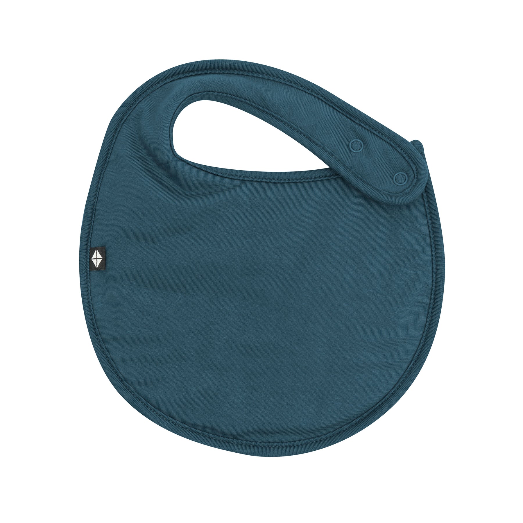 The front of the Cushy Bib in Atlantic showing the snap closures