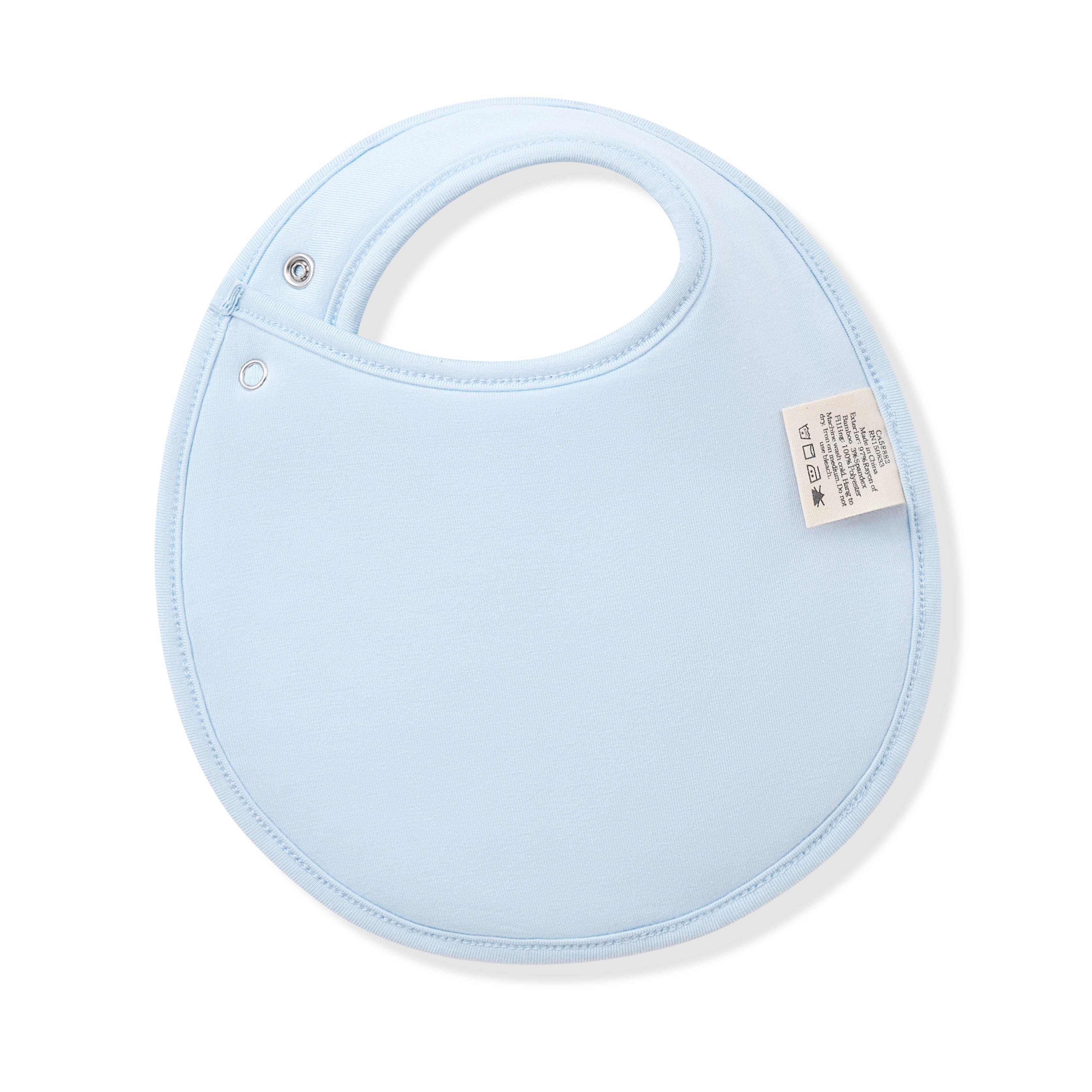 The back of the Cushy Bib in Gingham Breeze showing the light blue backing