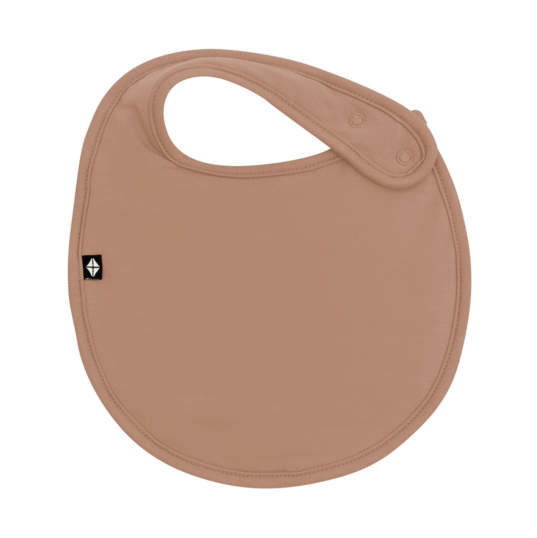 Front of Cushy Bib in Latte showing the snap closure