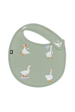 The front of the Cushy Bib in Silly Goose showing the snap closure