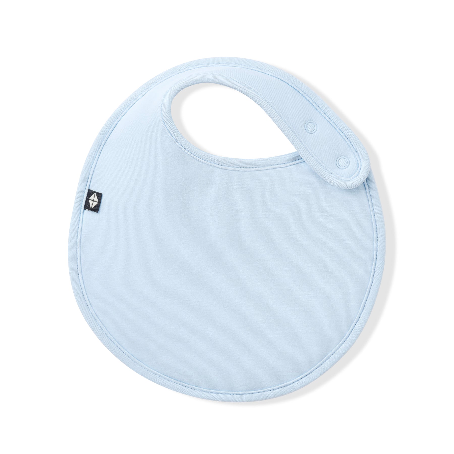 Font of the Cushy Bib in Breeze showing the snap closures