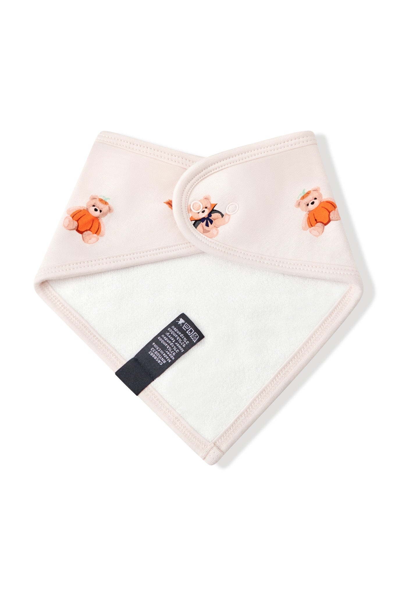 Back side of Beige Bib in Halloween Teddy print on a white background