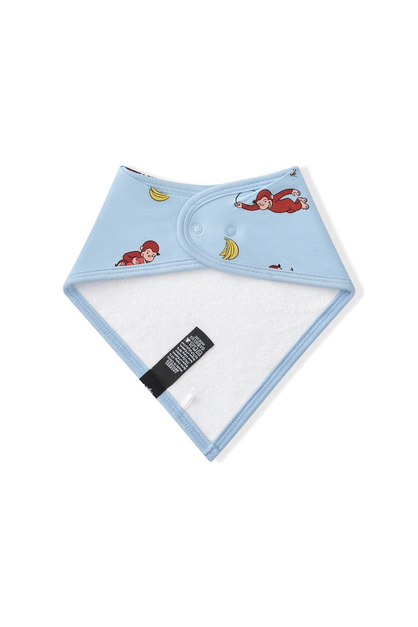 White fabric at the back side of Blue Bib in Curious George print on a white background