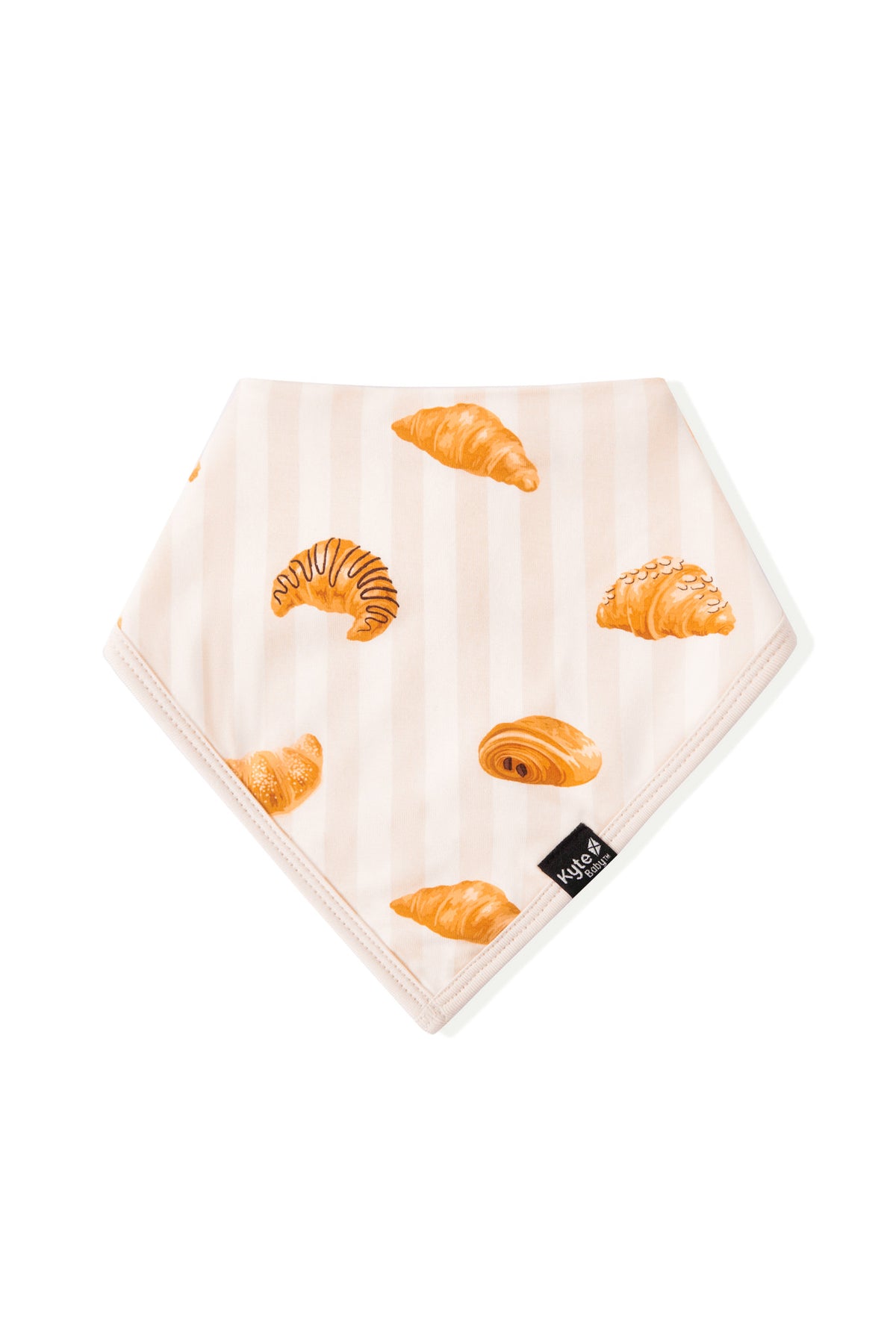 Bib in Croissant print on a white background