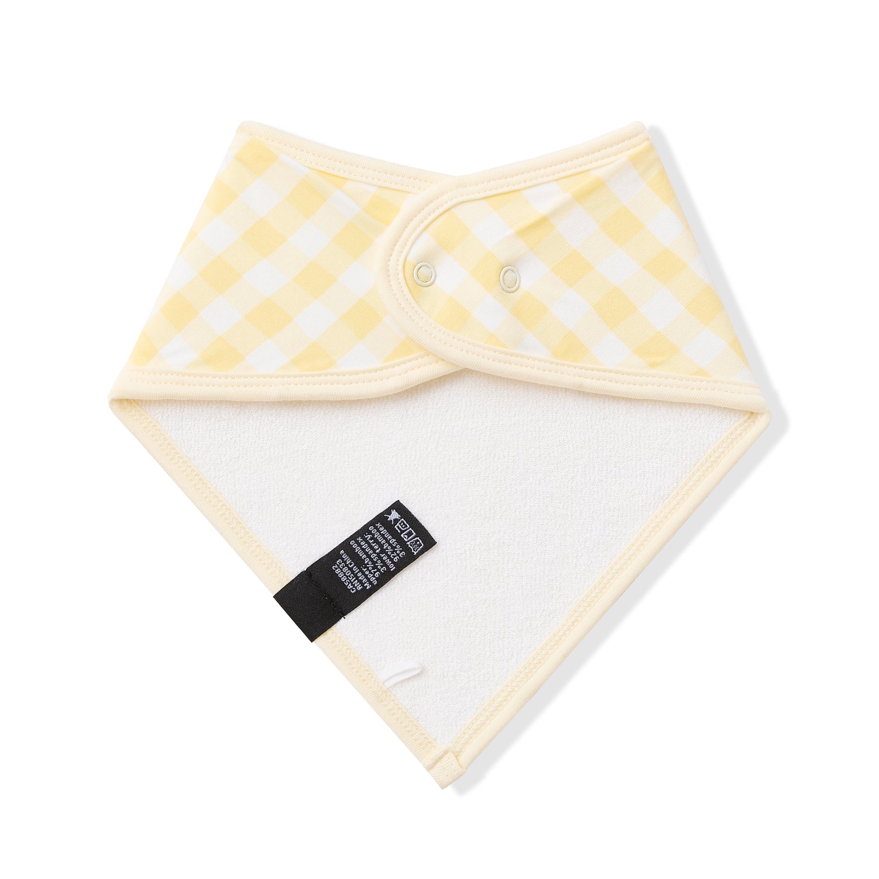 Back of the Bib in Gingham Chamomile showing the snap closure and bamboo terry cloth backing