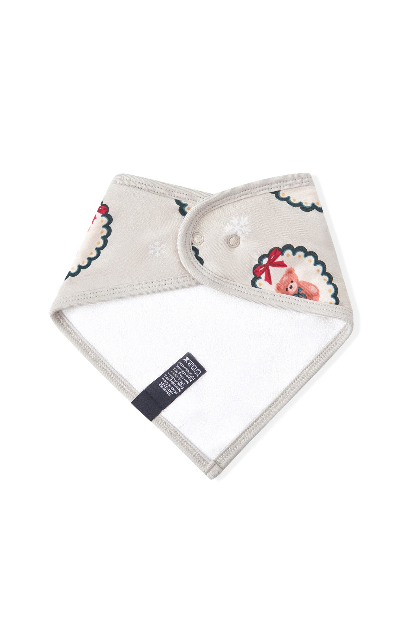 Back side of Bib in Holiday Medallion print on a white background
