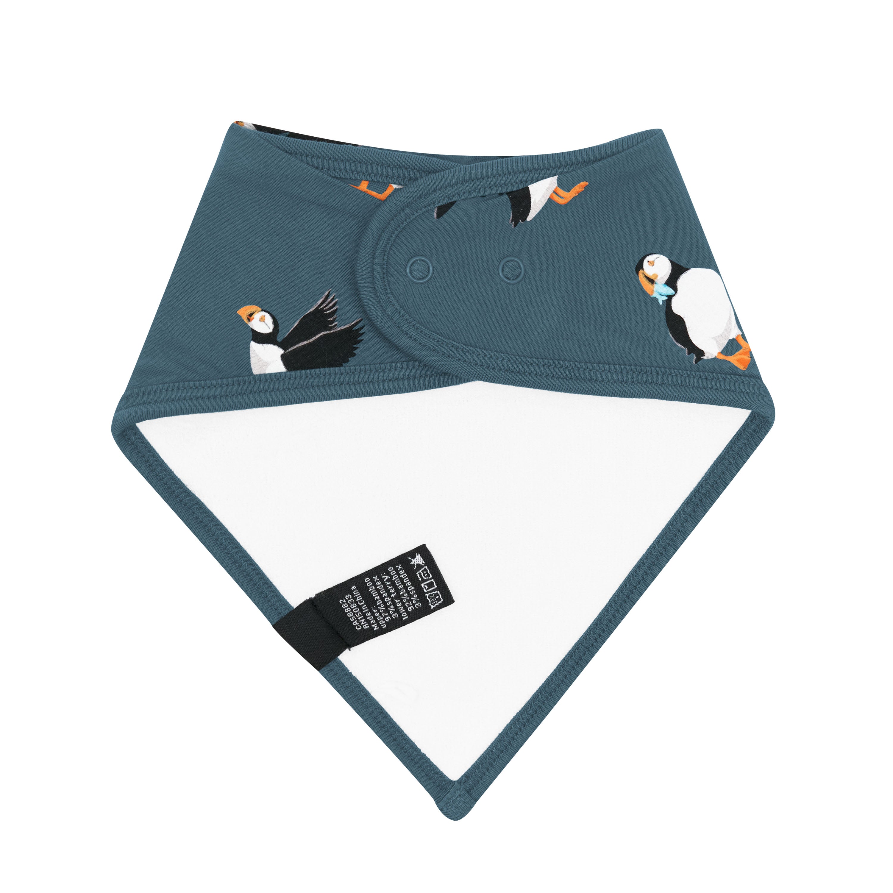 The back of the Bib in Puffin showing the snap closures and bamboo terry backing