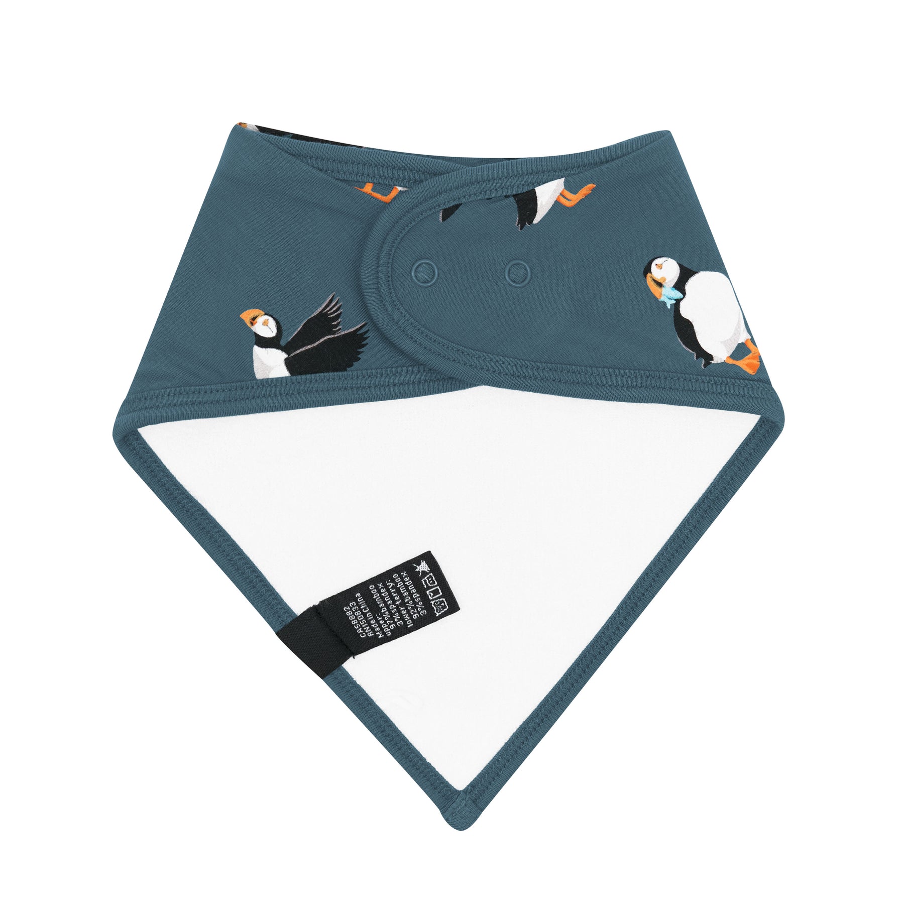 The back of the Bib in Puffin showing the snap closures and bamboo terry backing