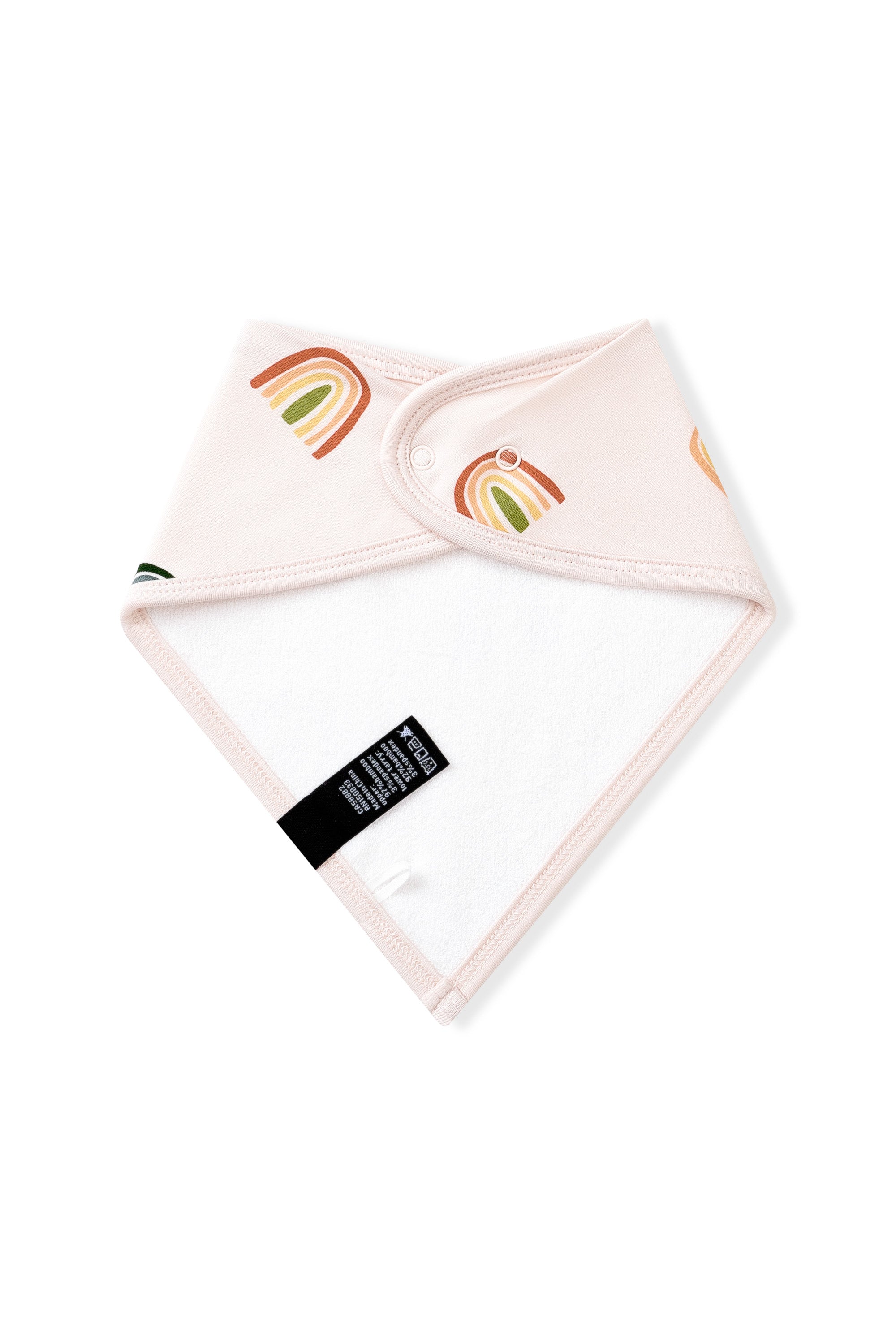 White fabric on the back side of Vanilla cream Bib in Retro Rainbow print on a white background