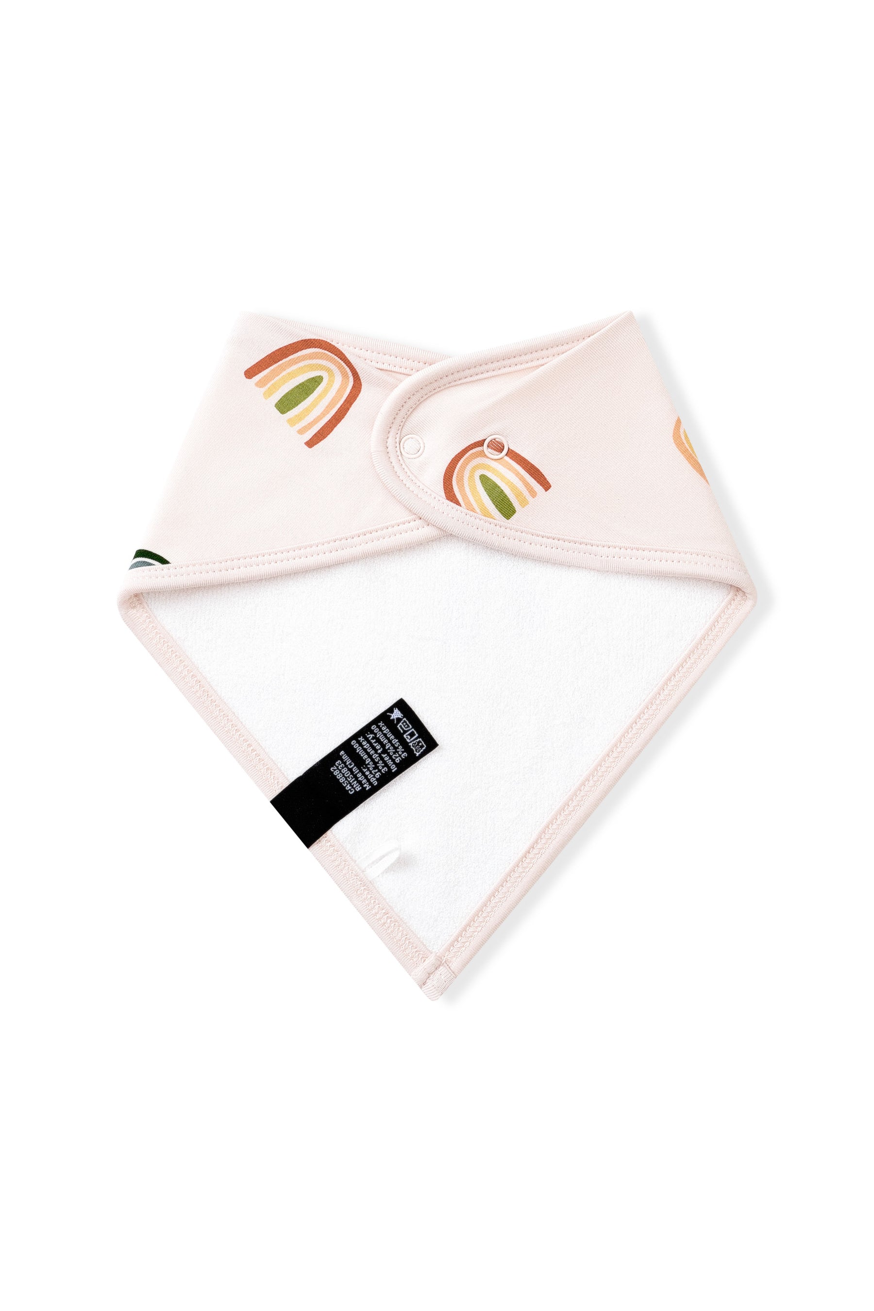 White fabric on the back side of Vanilla cream Bib in Retro Rainbow print on a white background