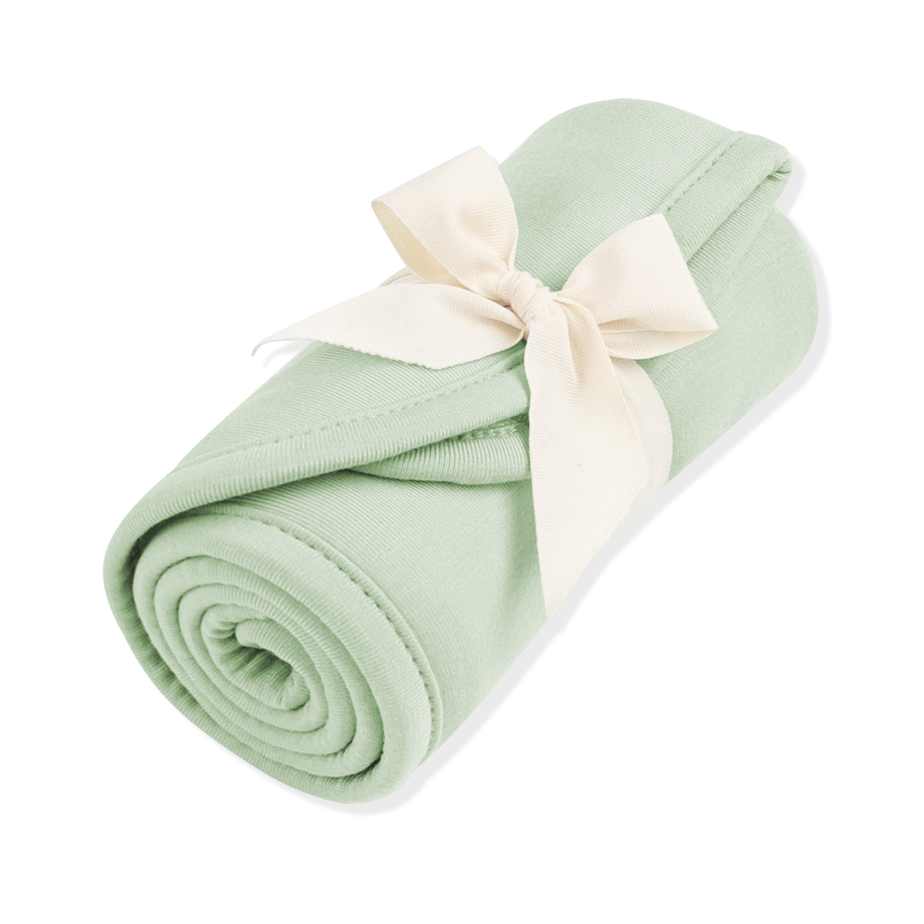 Burp Cloth in Basil shown rolled in its packaging tied with a linen bow