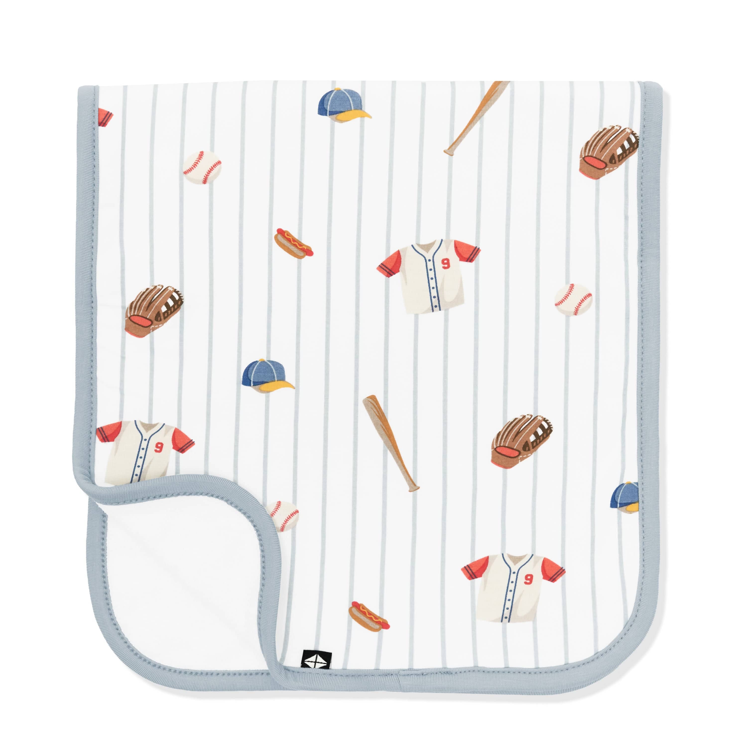 Burp Cloth in Home Run folded in half with the corner flipped up