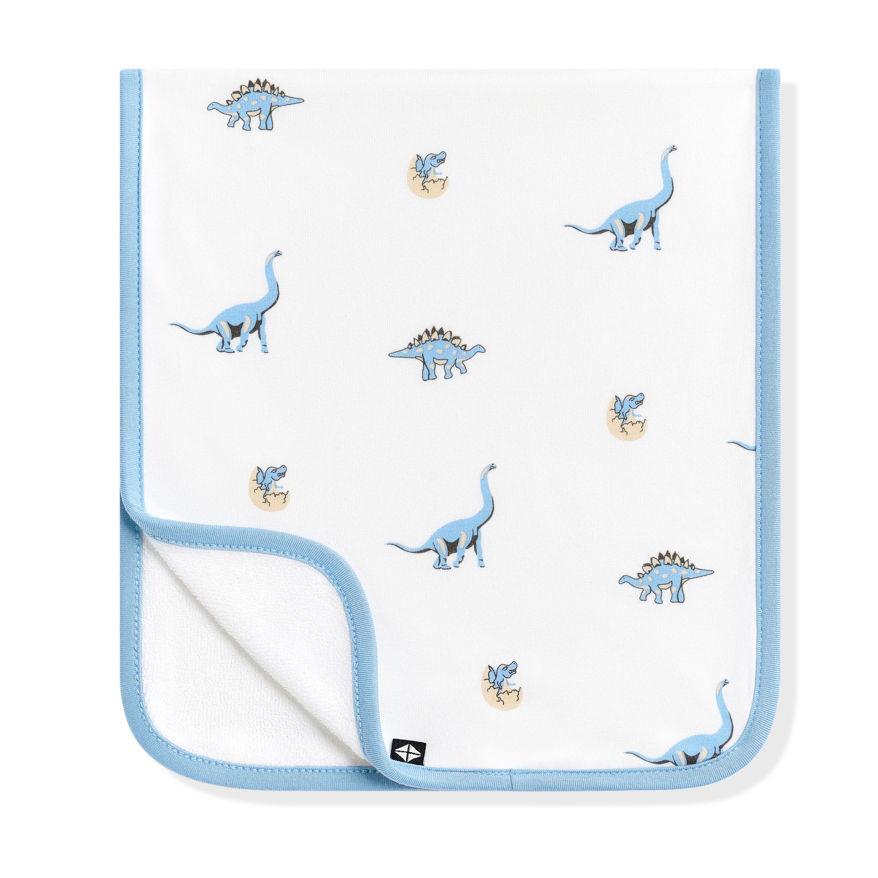 Burp Cloth in Jurassic folded in half with the corner folded upwards