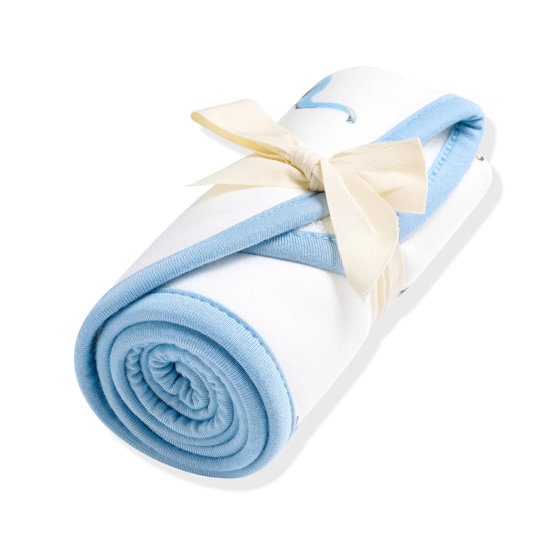 Burp Cloth in Jurassic shown rolled in its packaging