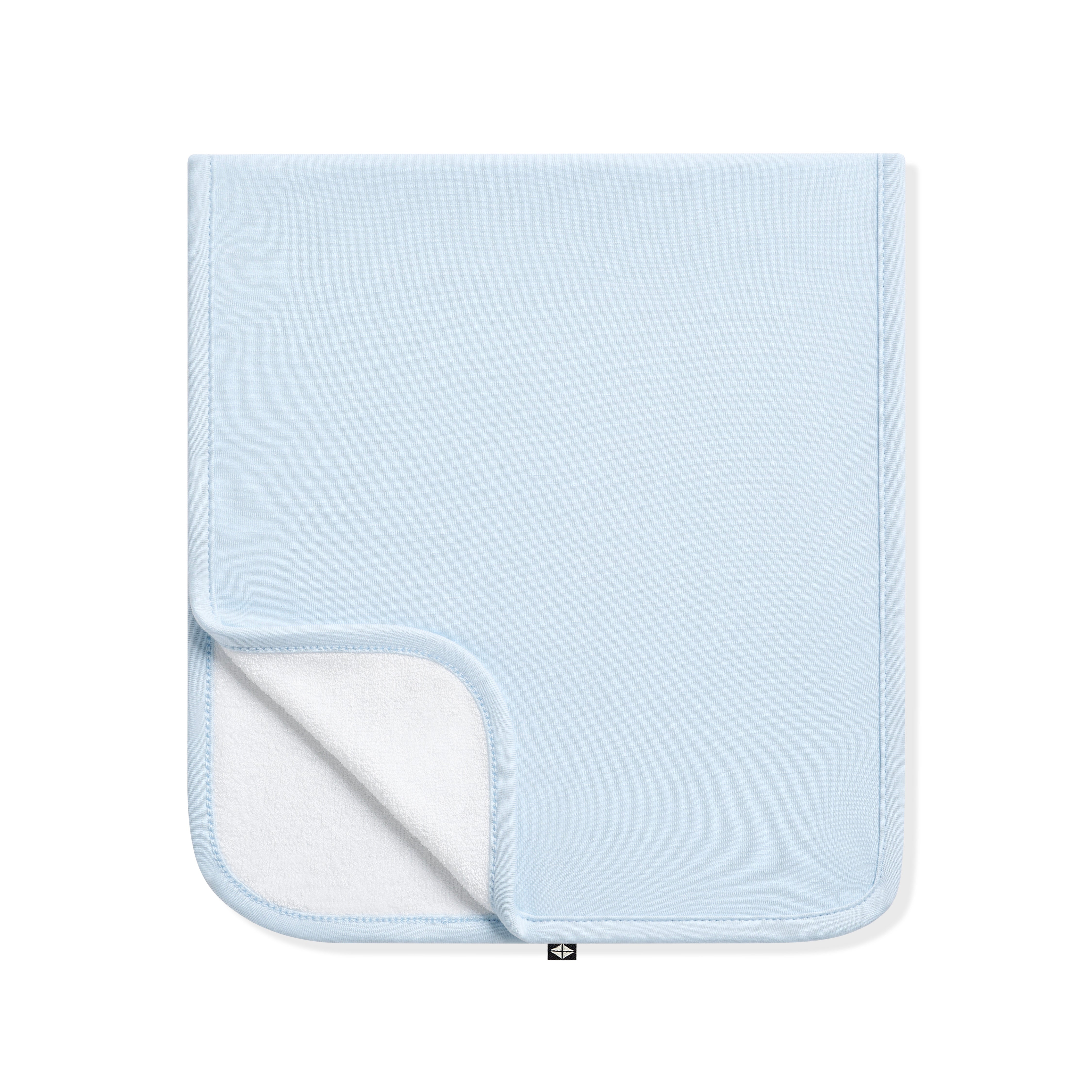 Burp Cloth in Breeze folded in half with the corner flipped over showing the bamboo terry backing
