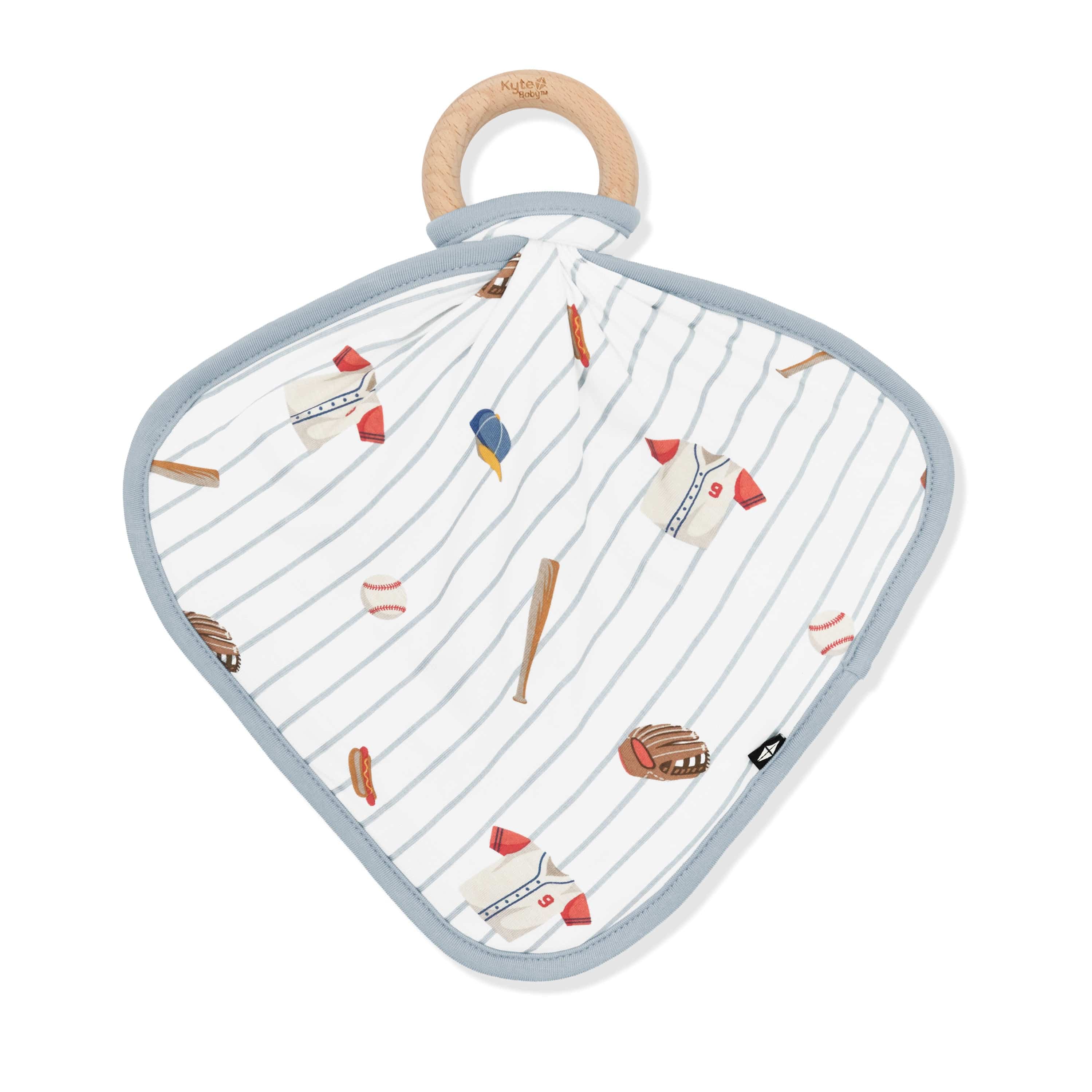 The front of the Lovey in Home Run with Removable Wooden Teething Ring showing the baseball smooth top layer attached to a wooden ring
