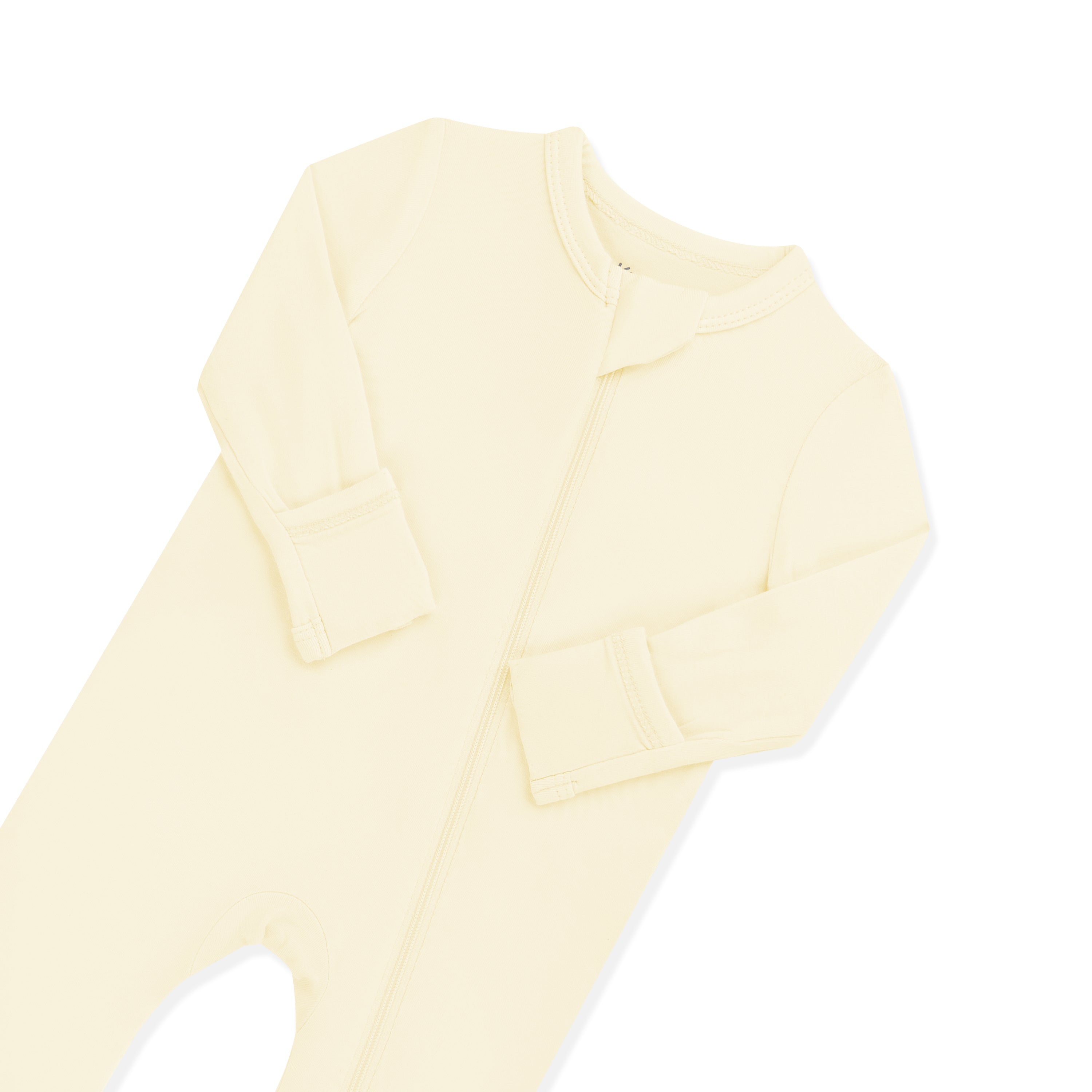Zipper garage and fold over hand cuffs shown on the Zippered Romper in Chamomile