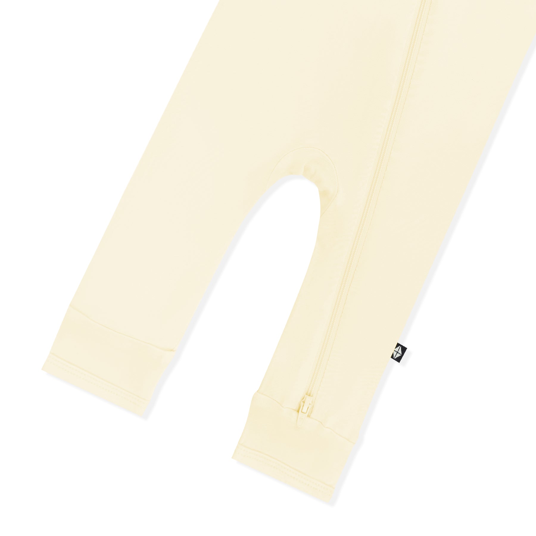 Zipper shown on the leg of the Zippered Romper in Chamomile