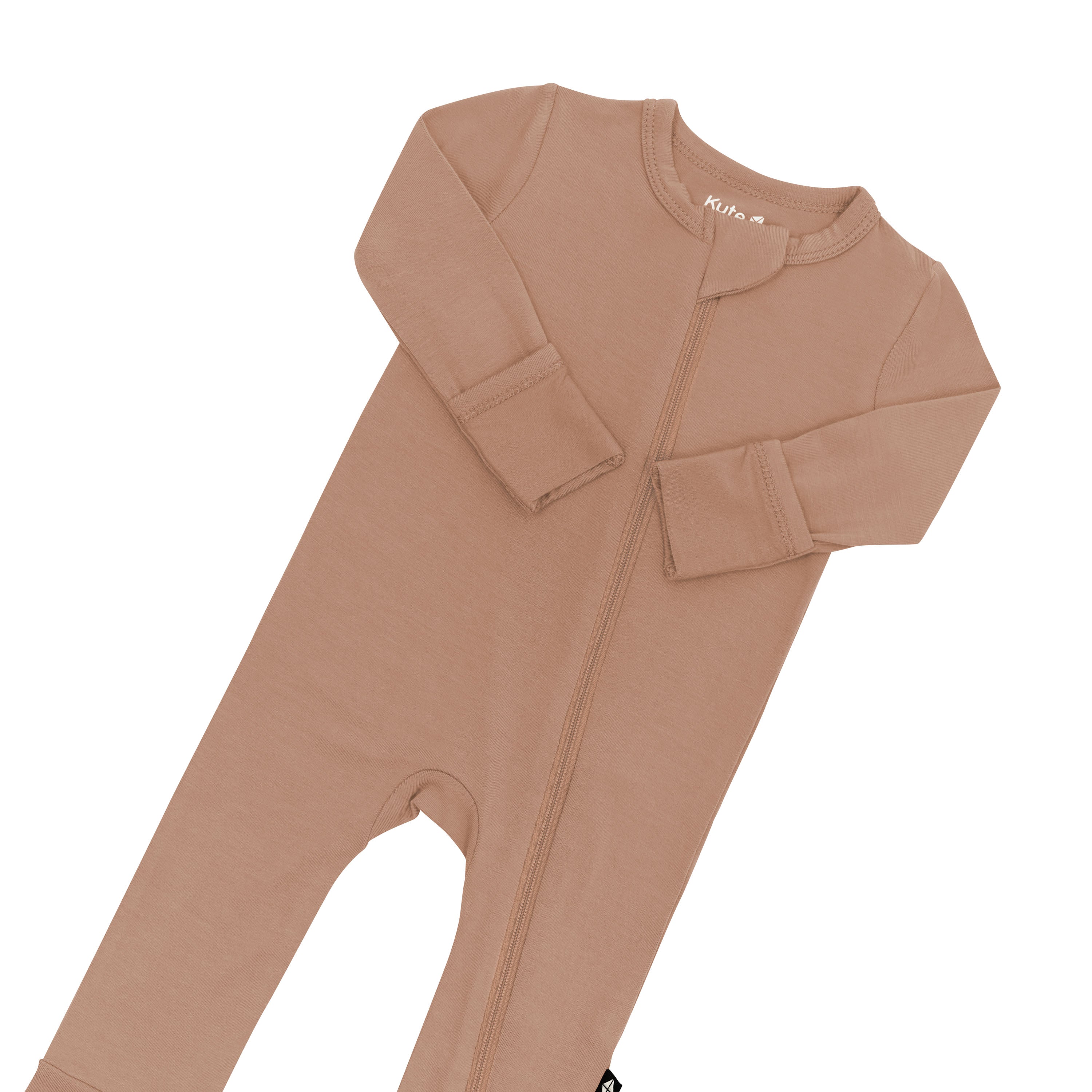 Zipper garage and fold over hand cuffs on the Zippered Romper in Latte