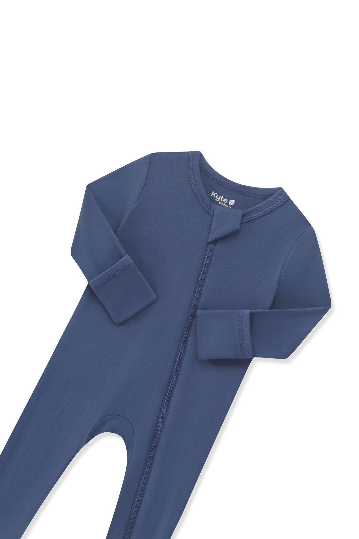 Close up of the zipper garage and fold over hand cuffs on the Zippered Romper in Oxford on a white background