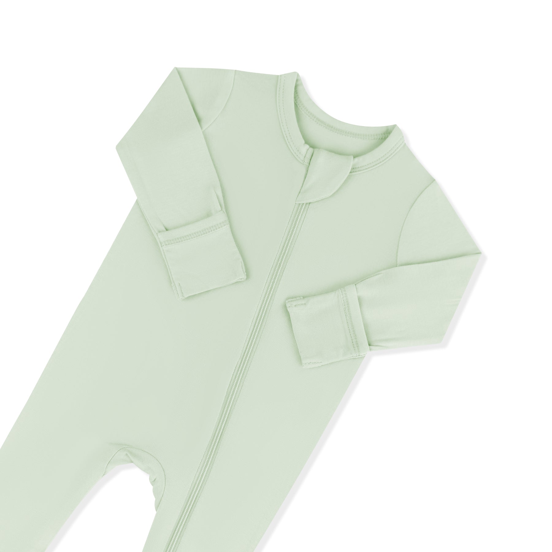 Close up of the zipper garage and fold over hand cuffs on the Zippered Footie in Basil