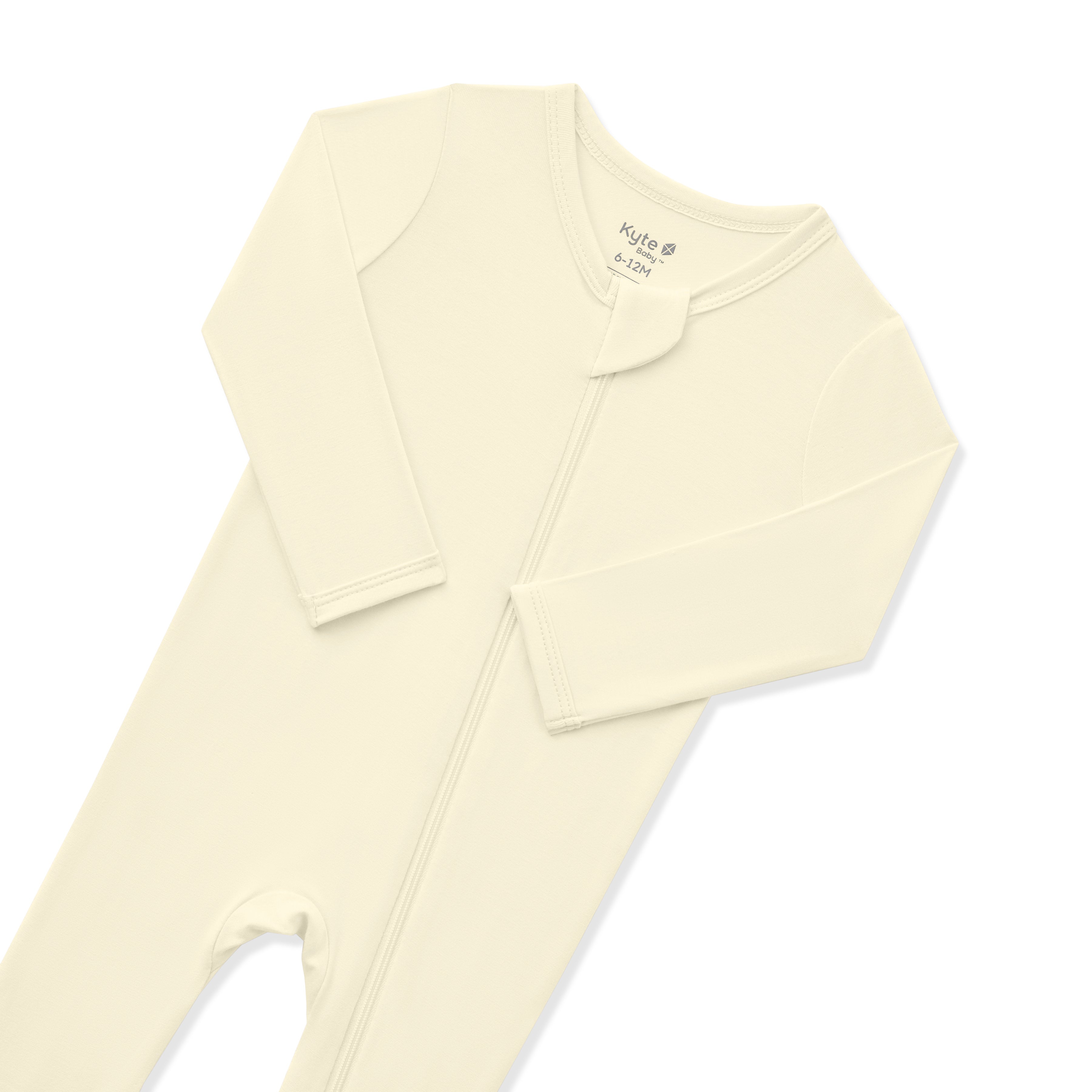 Close up of the zipper garage and fold over hand cuffs shown on the Zippered Footie in Chamomile