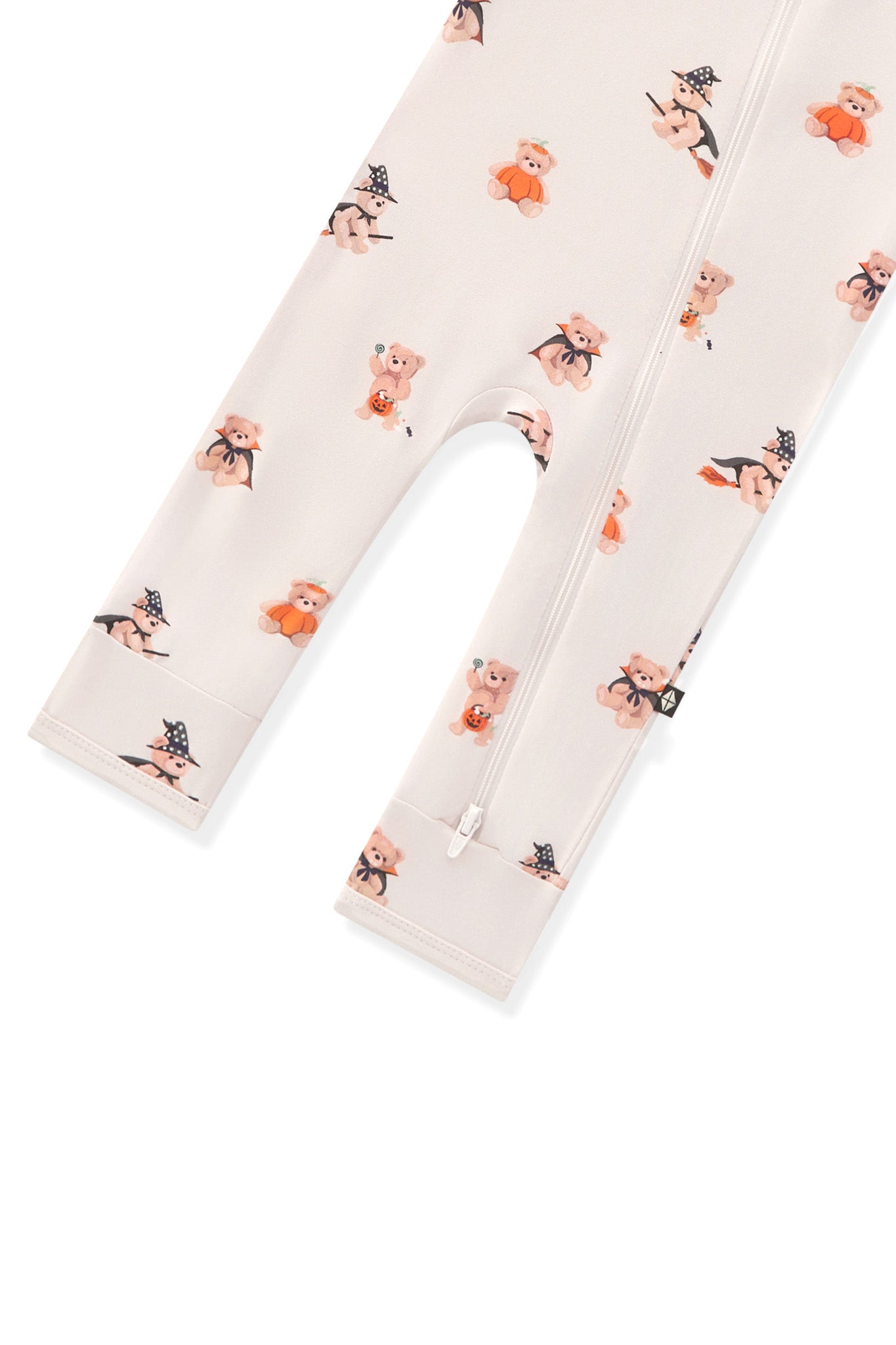 Bottom part of Beige Zippered Romper in Halloween Teddy print on a white background