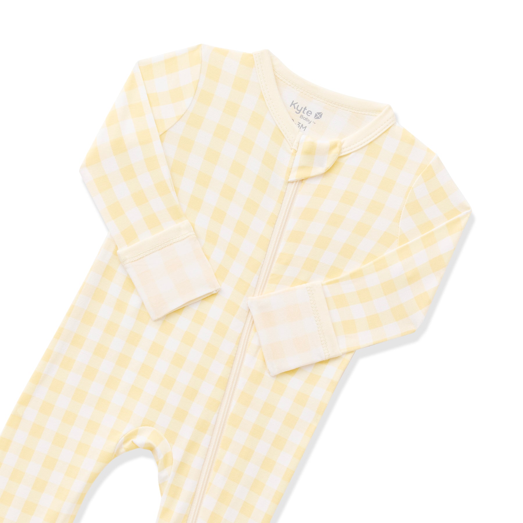 Zipper garage and fold over hand cuffs shown on the Zippered Romper in Gingham Chamomile