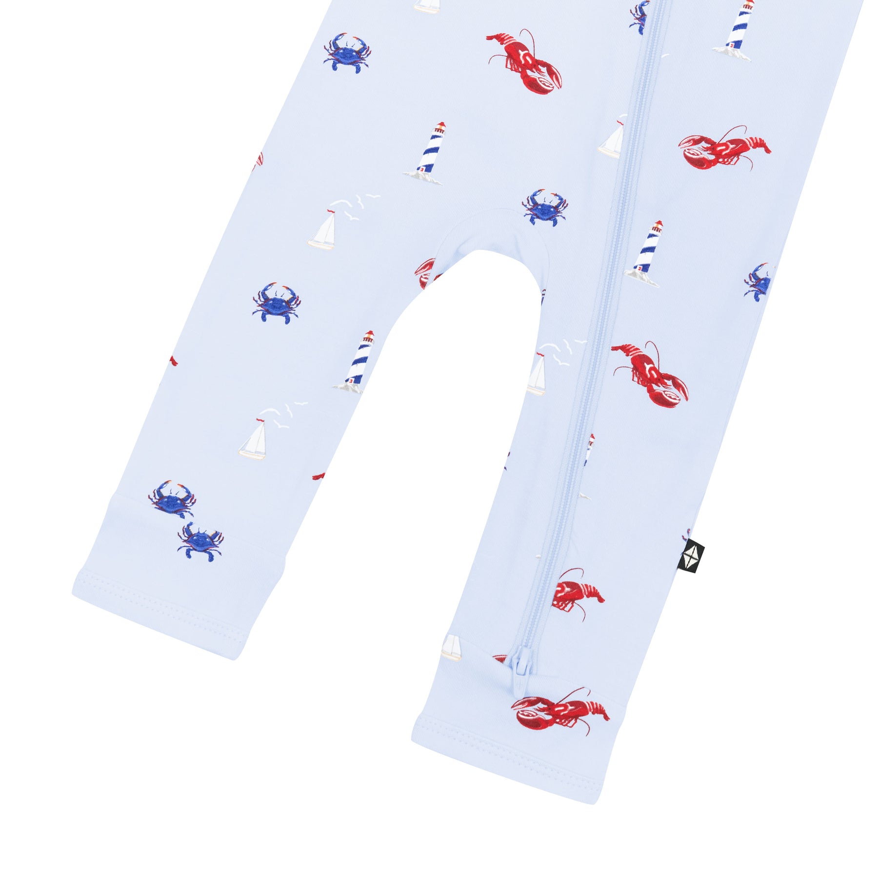 Double zipper shown on the leg of the Zippered Romper in Harbor