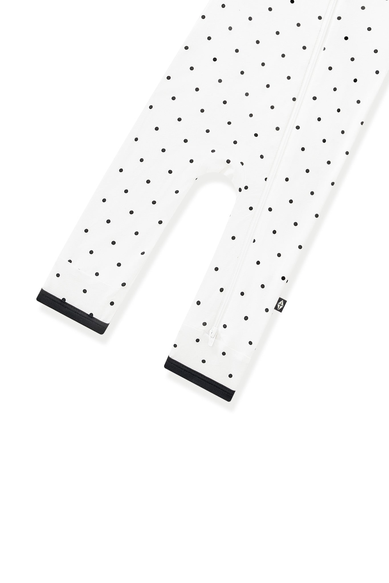 Bottom part of Zippered Romper in Midnight Polka Dot with black trim on white background