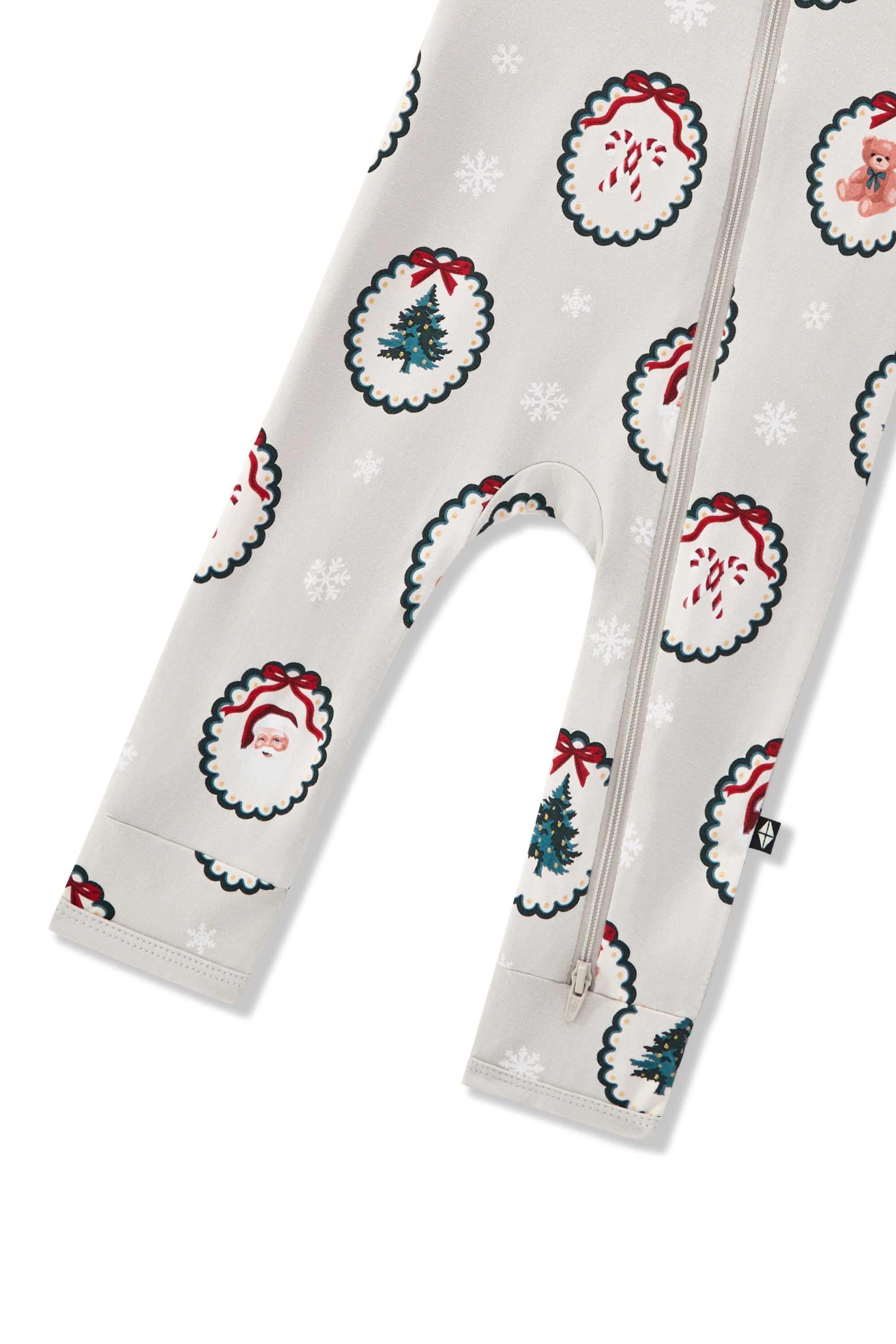 Bottom part of Zippered Romper in Holiday Medallion print on a white background