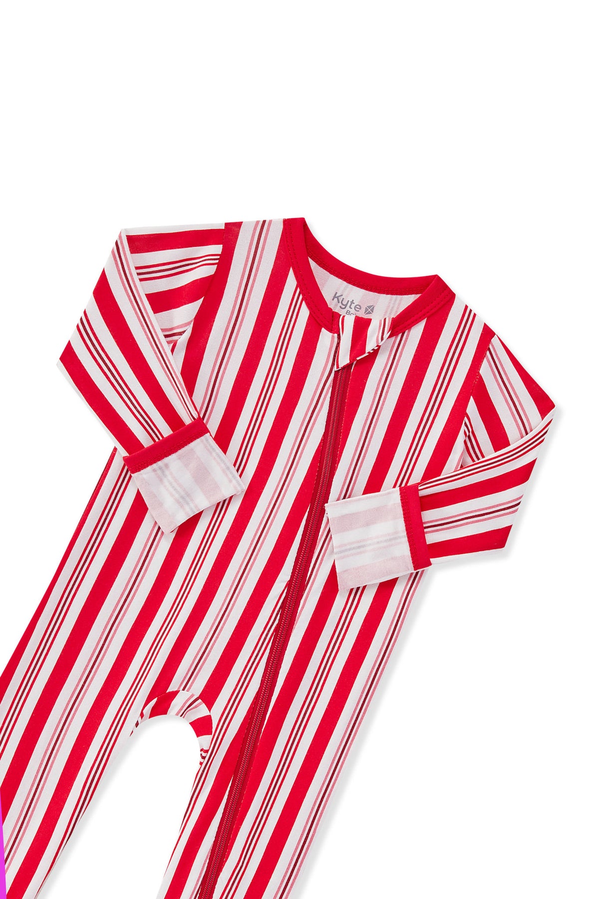 Zippered Romper in red and white Peppermint Stripes print with zipper garage on a white background
