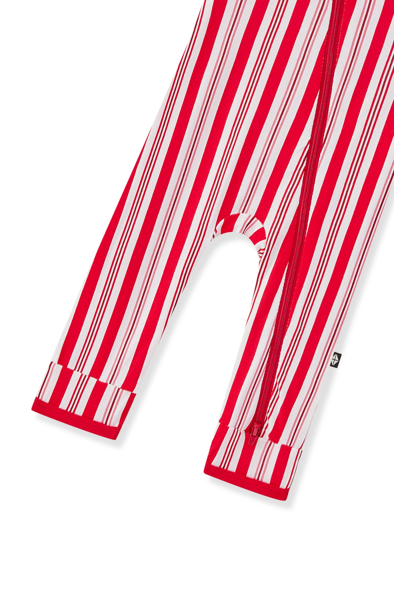 Bottom part of Zippered Romper in red and white Peppermint Stripes print on a white background