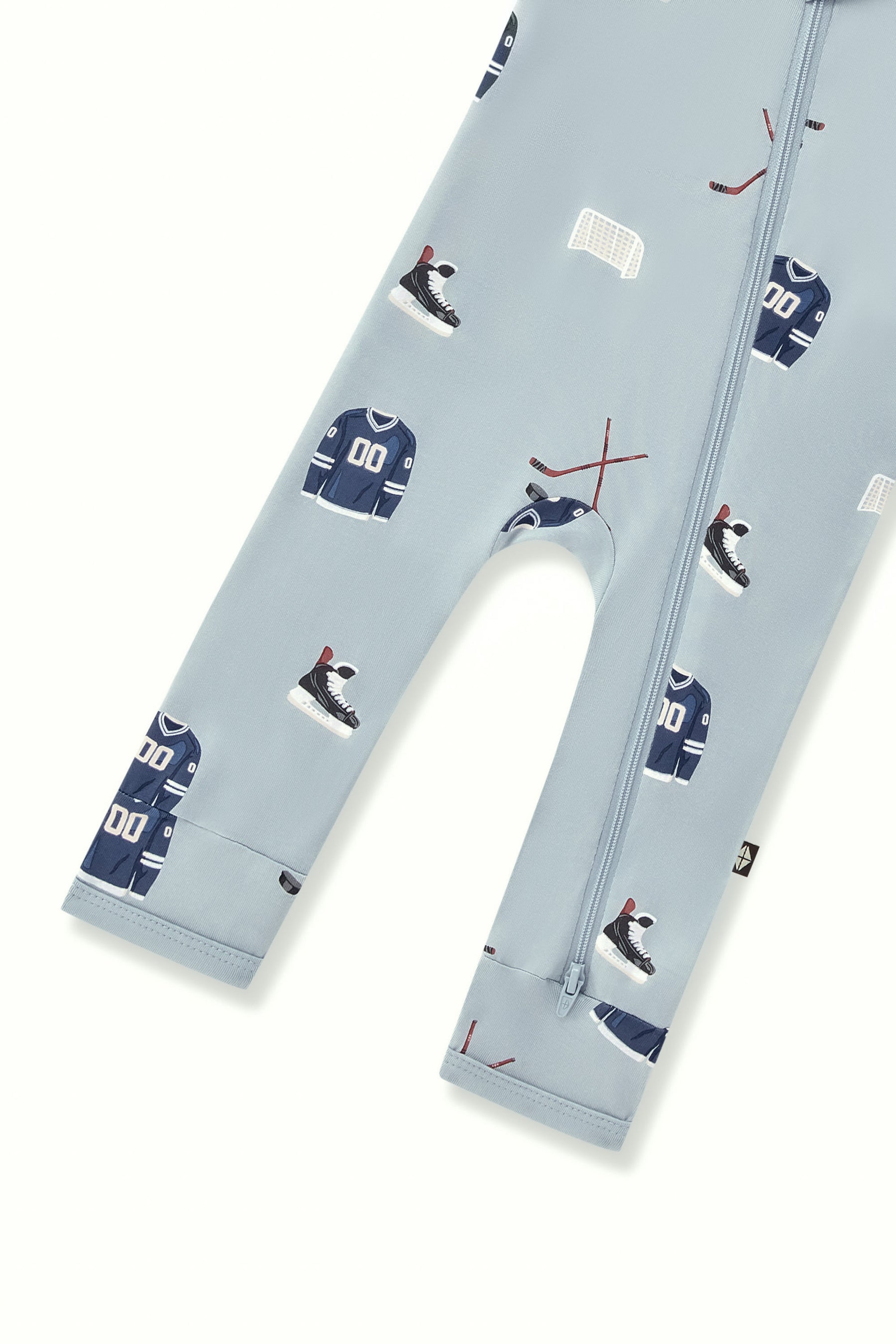 Bottom part of Zippered Romper in Vintage Hockey print on a white background