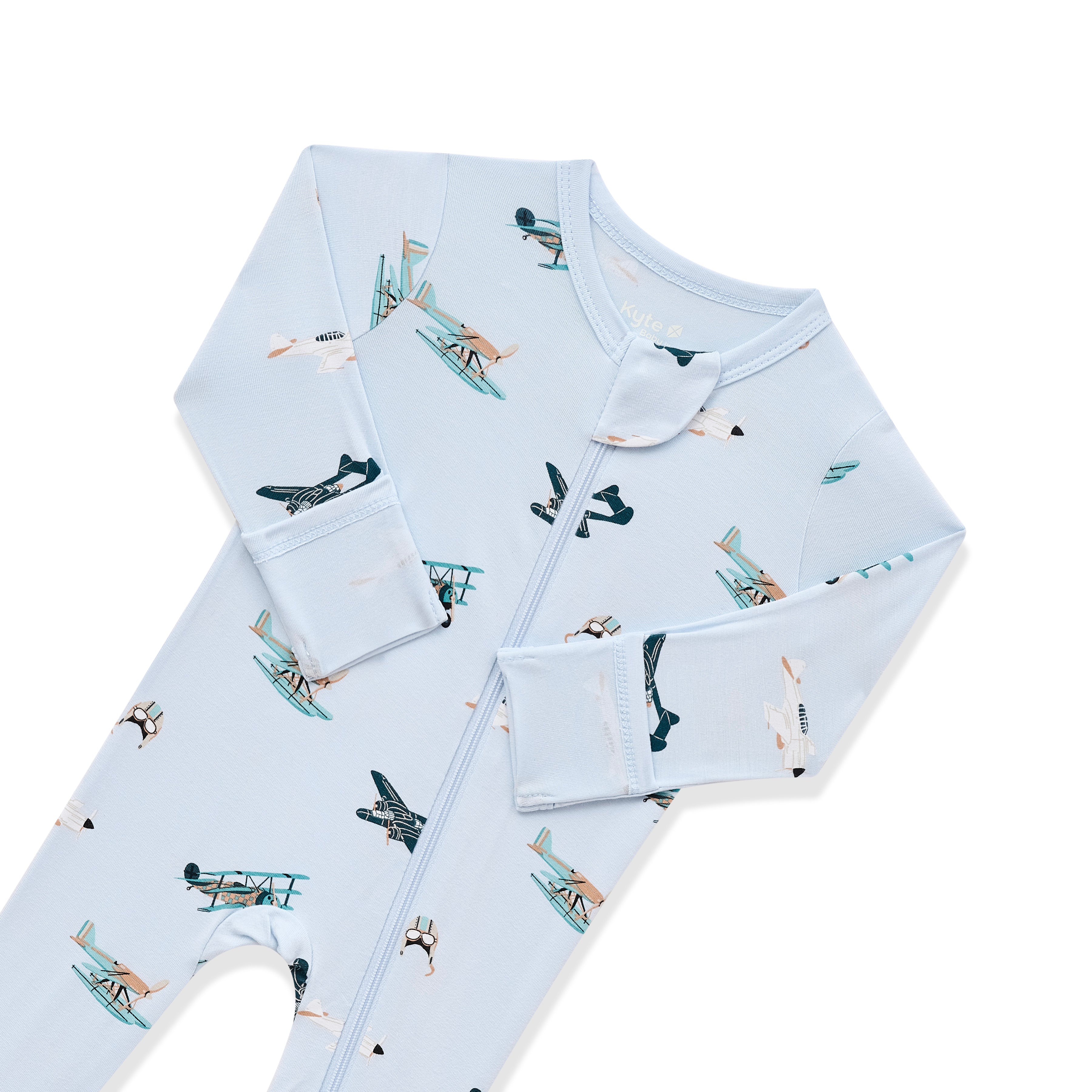 Close up of the zipper garage and fold over hand cuffs shown on the Zippered Footie in Take Off