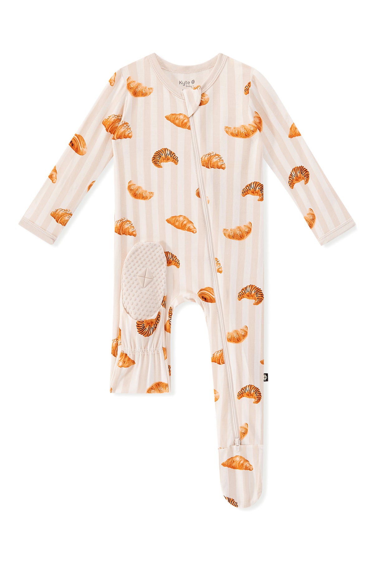 Zippered Footie in Croissant print with dotted footie on a white background