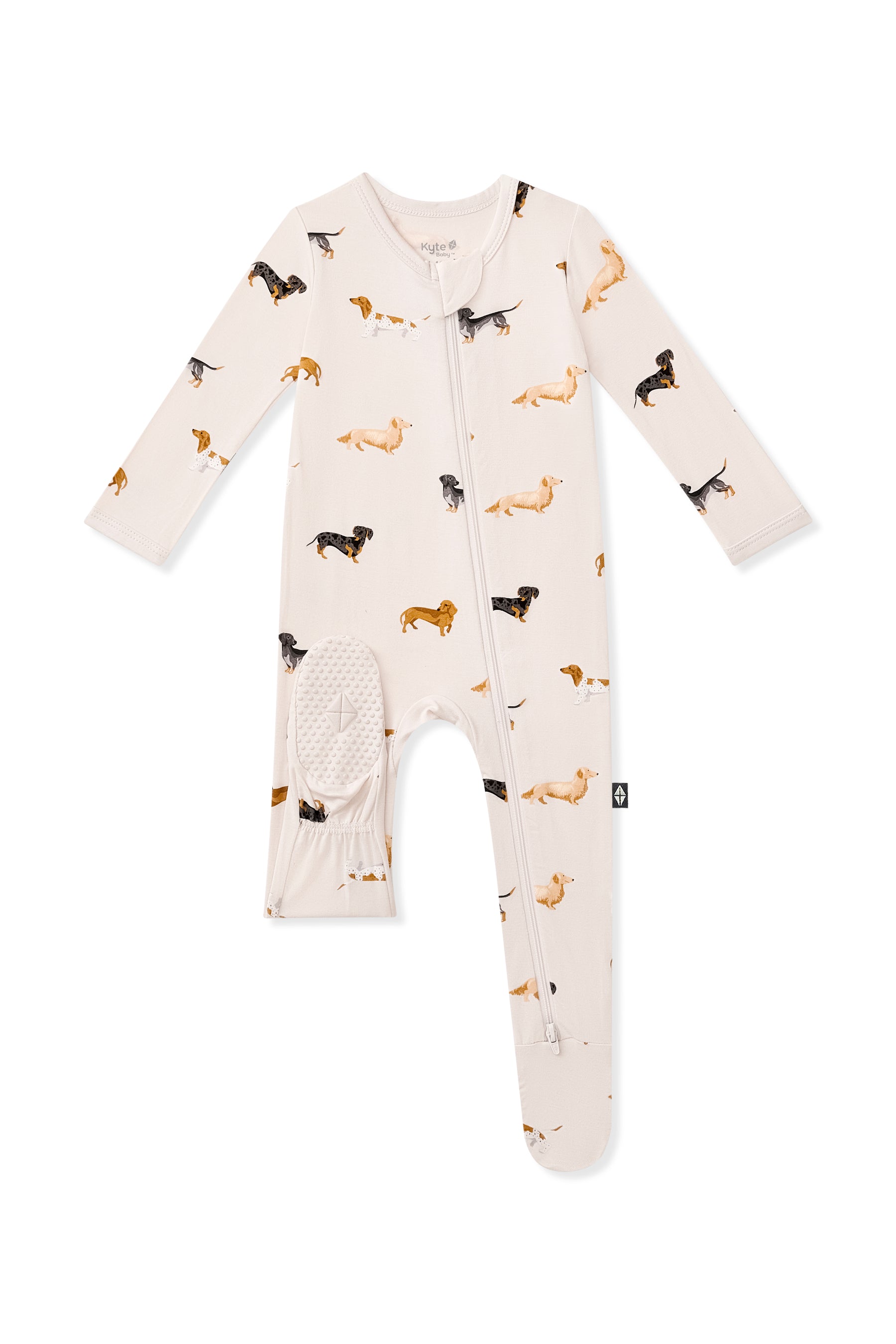 Bottom footies of Beige Zippered Footie in Dachshund print on white background 