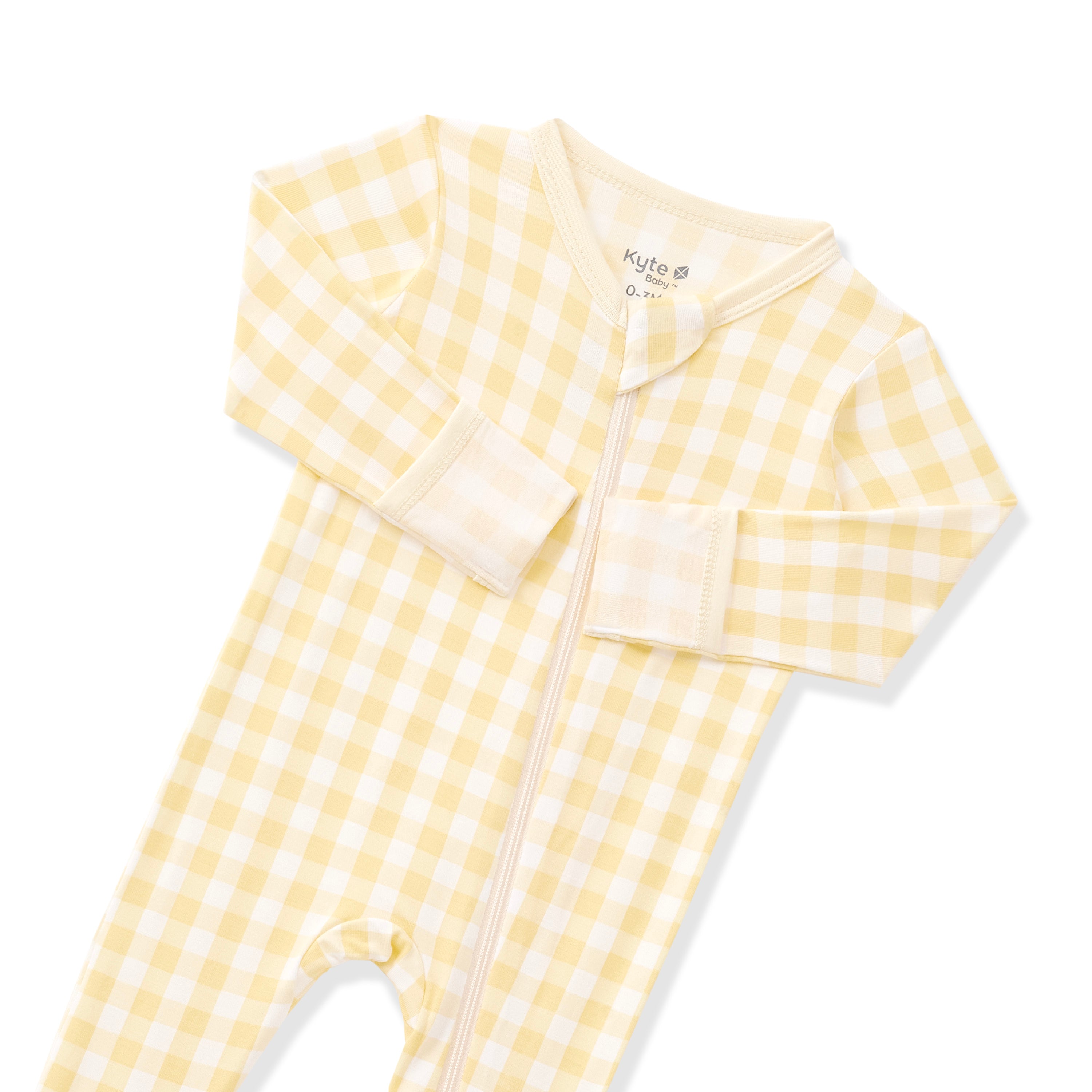 Close up of the zipper garage and fold over hand cuffs on the Zippered Footie in Gingham Chamomile