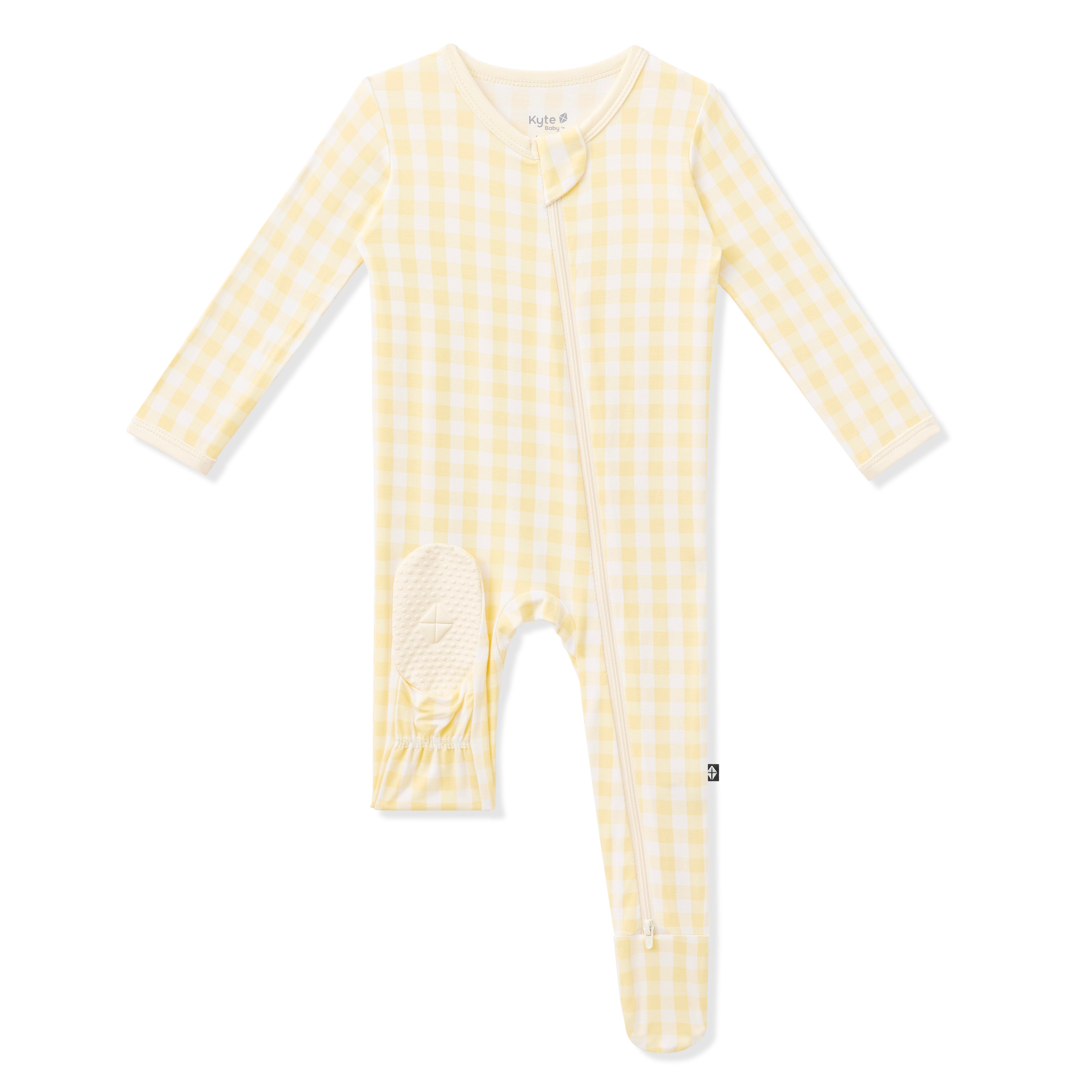 Light yellow foot pad shown on the Zippered Footie in Gingham Chamomile
