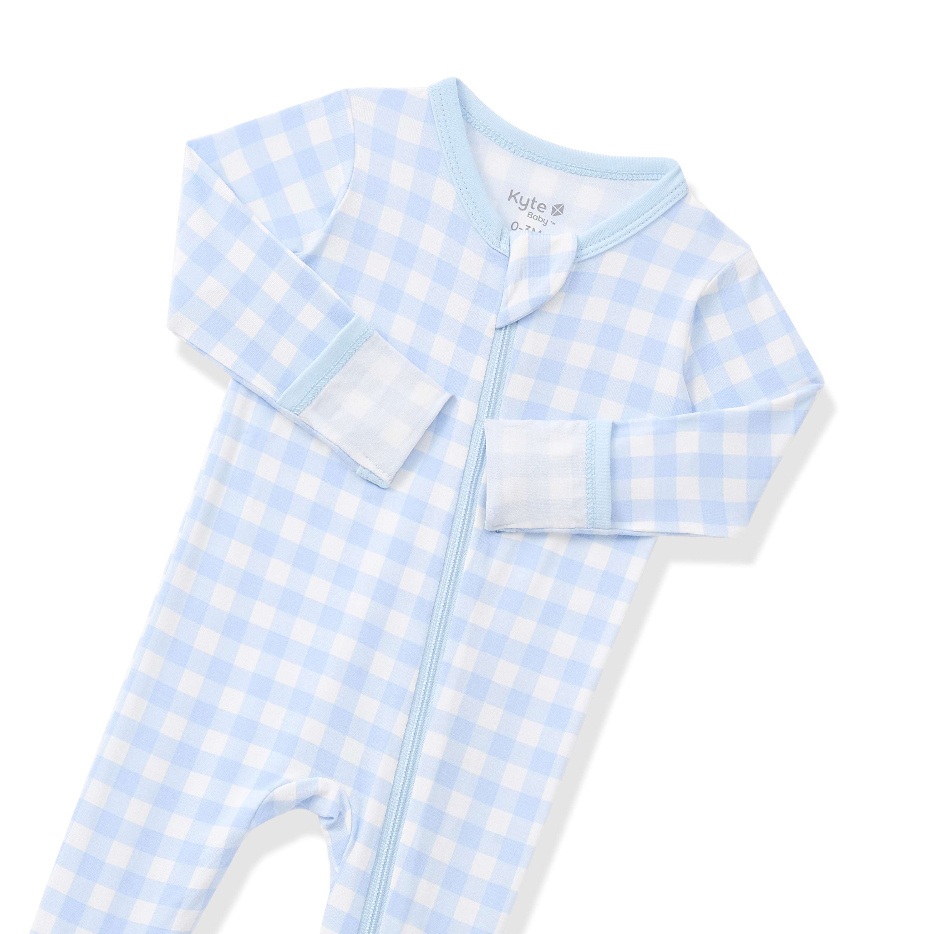 Close up of the zipper garage and fold over hand cuffs shown on the Zippered Footie in Gingham Breeze