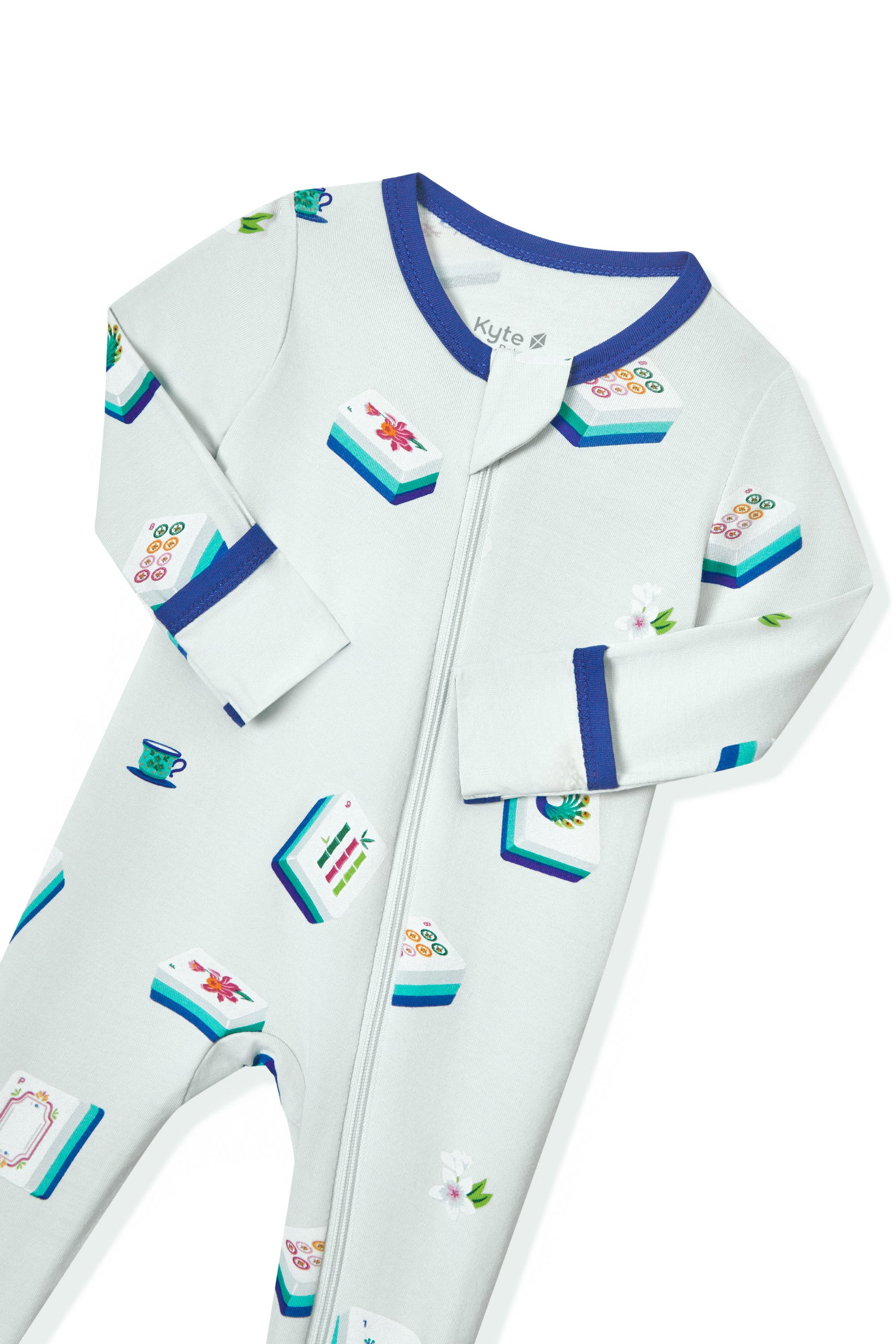 Blue Zippered Footie with zipper garage in Mahjong pattern on a white background
