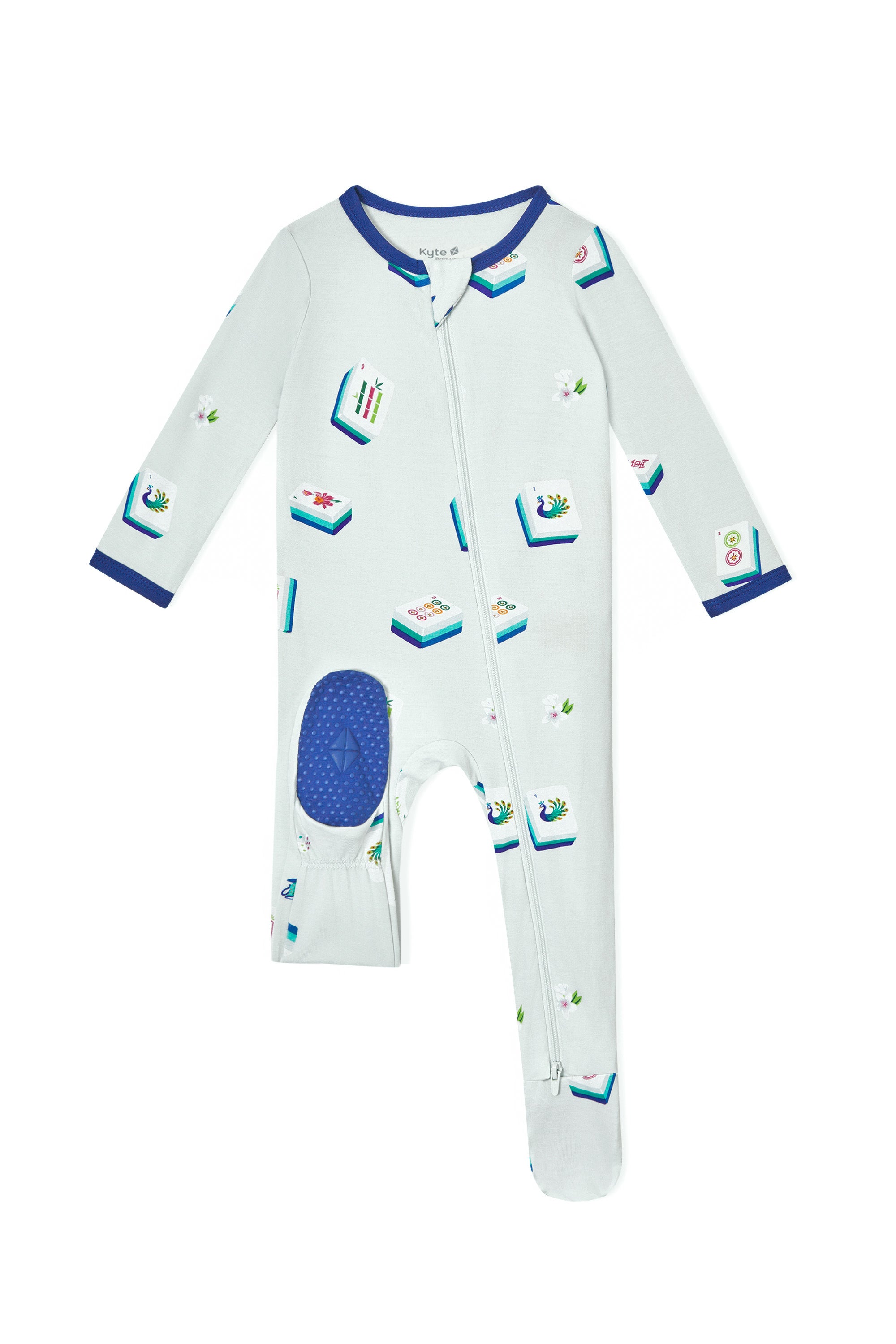 Dotted navy footie on blue Zippered Footie with Mahjong pattern on a white background