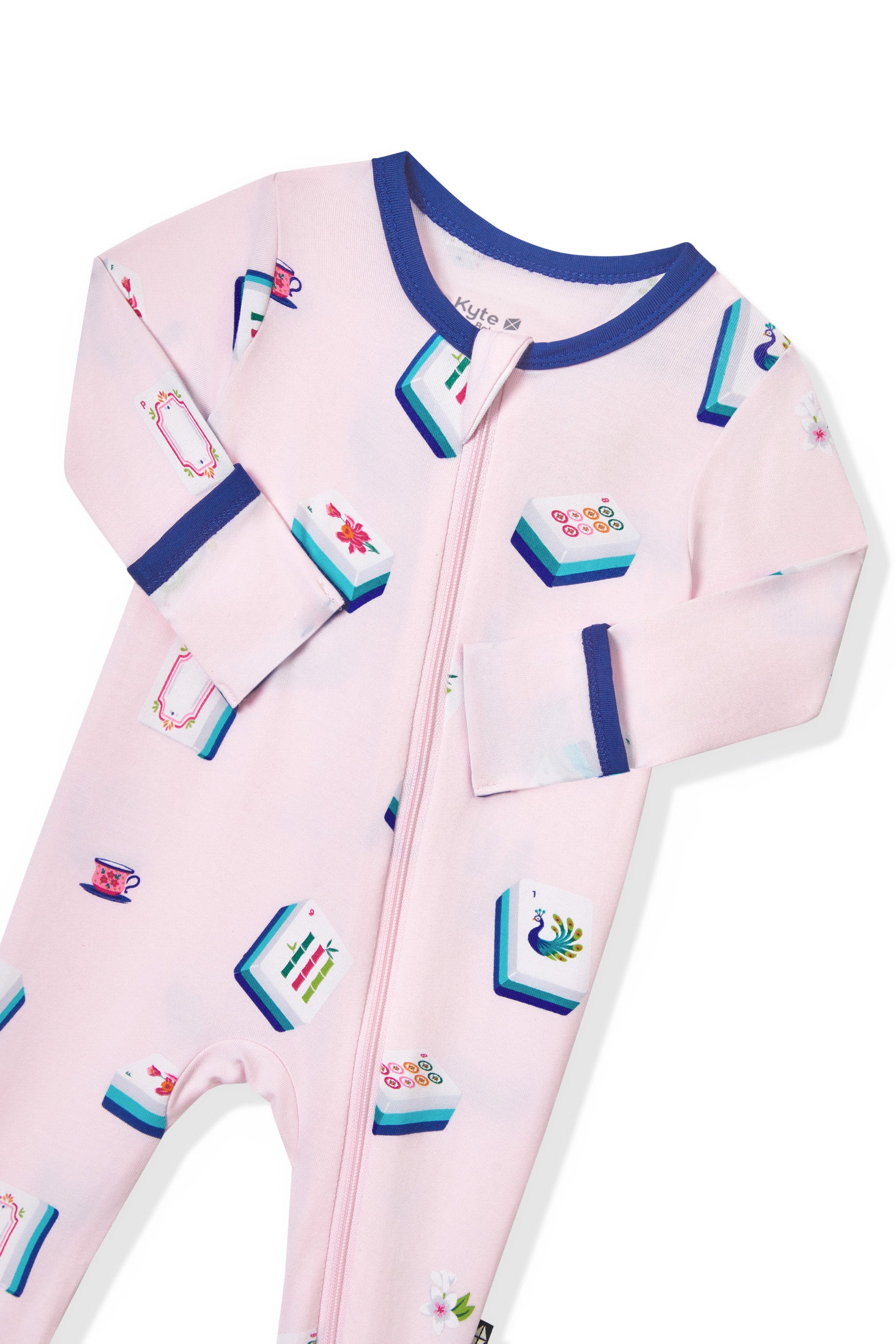 Pink Zippered Footie with zipper garage in Mahjong pattern on a white background