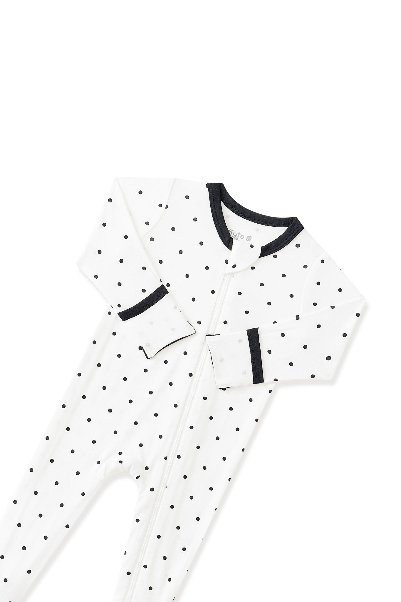 Top part of Zippered Footie in Midnight Polka Dot with black trim white background