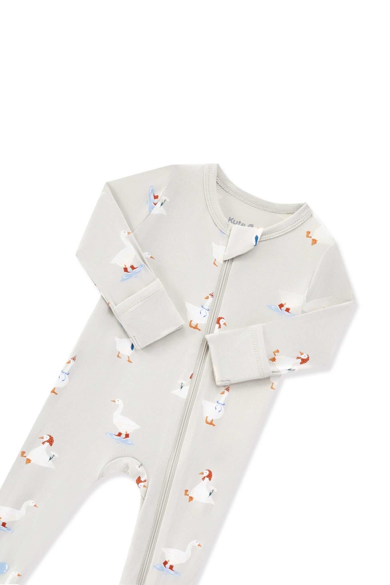 Zippered Footie in Oat Silly Goose print with folded sleeves on a white background
