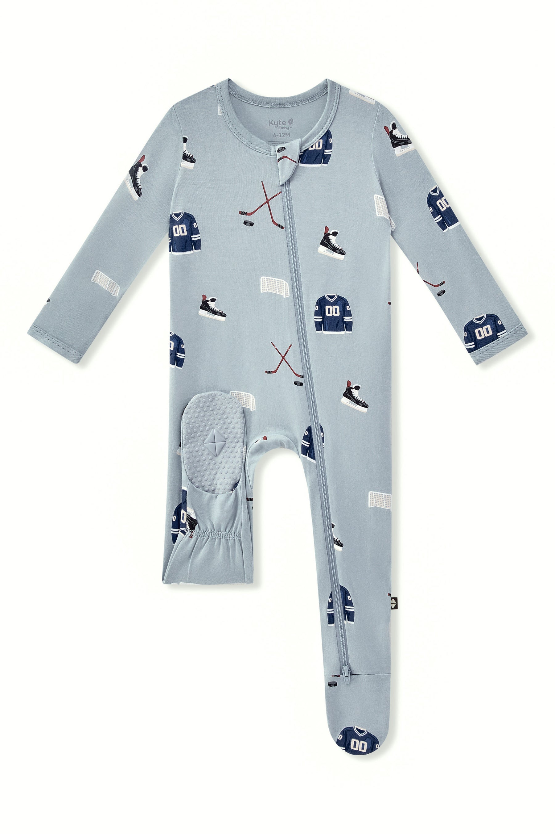 Zippered Footie in Vintage Hockey print with dotted footie on a white background